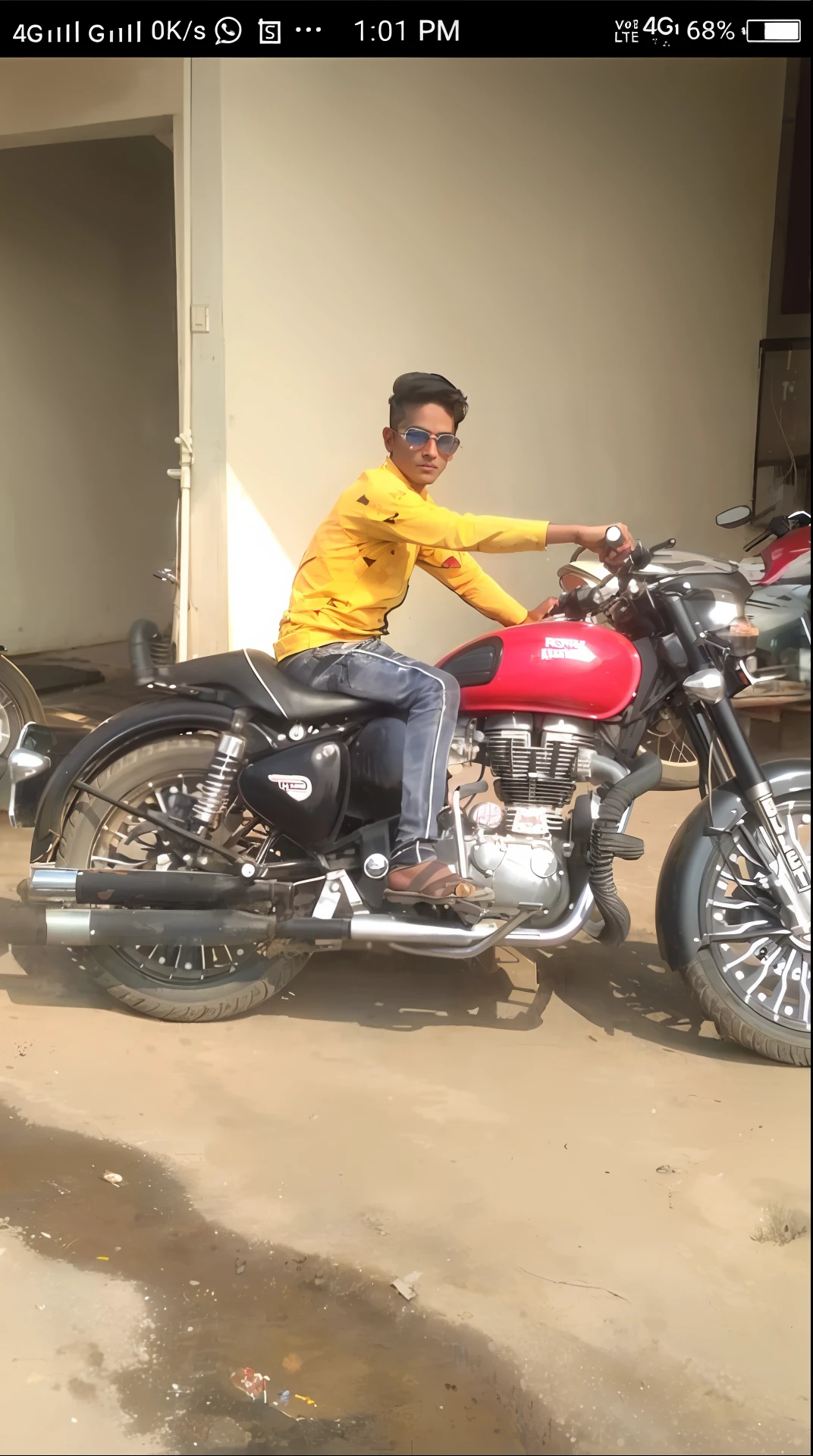 there is a man sitting on a motorcycle in front of a building, without helmet, indian, stylish pose, * colour splash *, he is a long boi ”, biker, motorbiker, indian super model, high quality upload, profile pic, inspired by Saurabh Jethani, motorbike, by Saurabh Jethani, motorcycle, with a cool pose