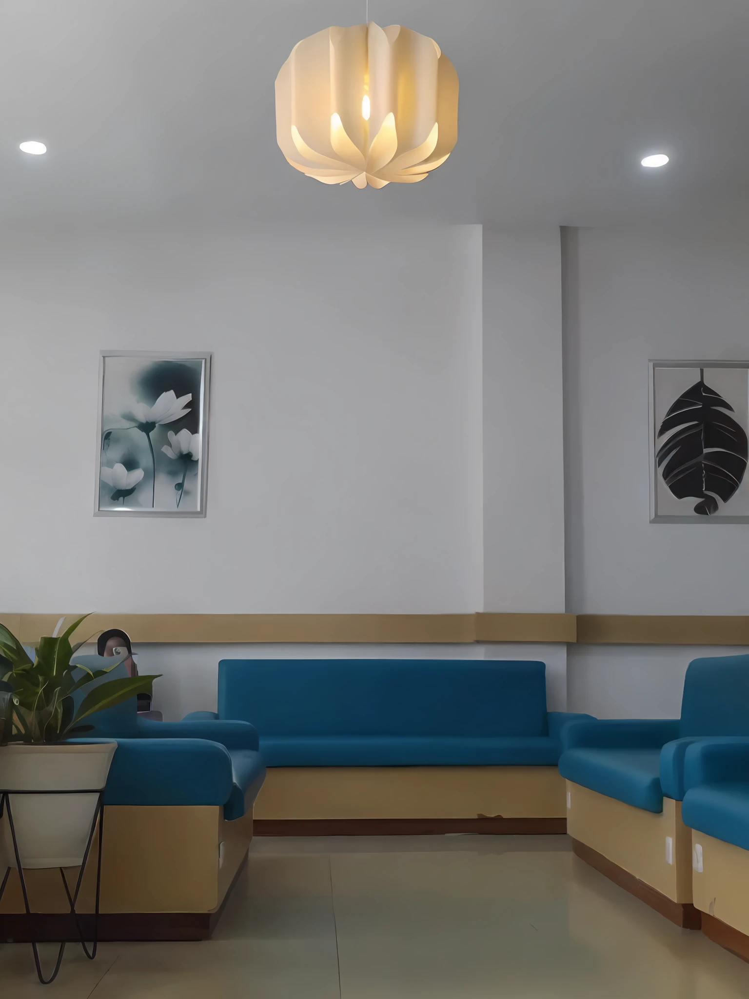 there is a blue couch and a table in a room, waiting room, doctors office, hospital interior, brightly lit blue room, brightly lit - style atmosphere, sitting in a waiting room, interior decoration, interior photograph, serene environment, office interior, with backdrop of natural light, peaceful environment, comfortable atmosphere, bright happy atmosphere, cheerful atmosphere, brightly lit room, lounge