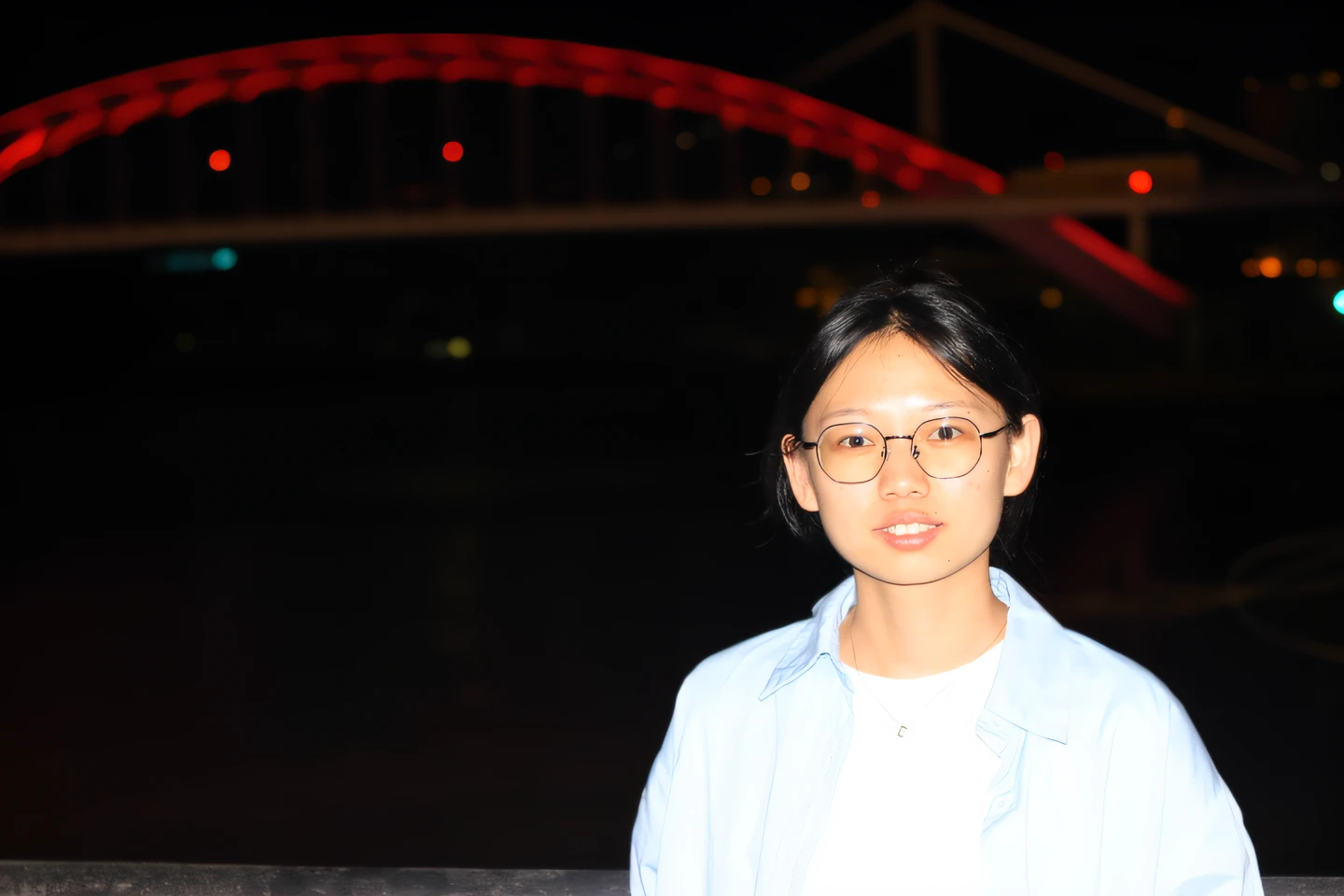 there is a woman standing in front of a bridge at night, photograph taken in 2 0 2 0, xintong chen, taken with canon 8 0 d, Zhang Pengzhen, Zhang Wanting, Li Zixin, taken with a pentax k1000, wenfei ye, Qiu Fang, zhelong xu, mingchen shen, huifeng huang