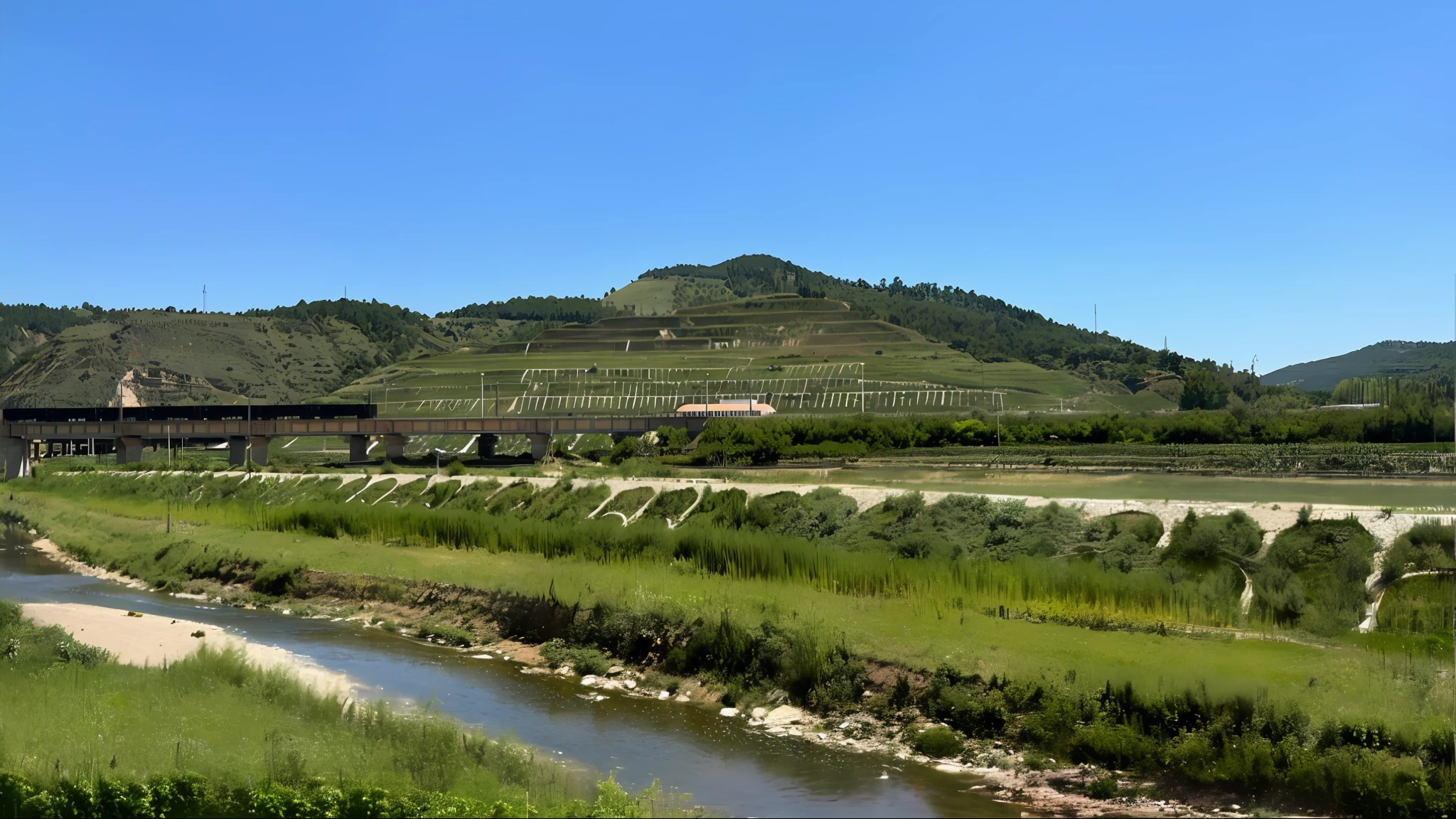 There is a train running on the rails by the river, terraced orchards and ponds, author:Karl Volk, Wine, visto ao longe, author:Robert S, A river of wine, hills in the background, an idyllic vineyard, viewed in profile from far away, overlooking river aufidius italy, Faraway view