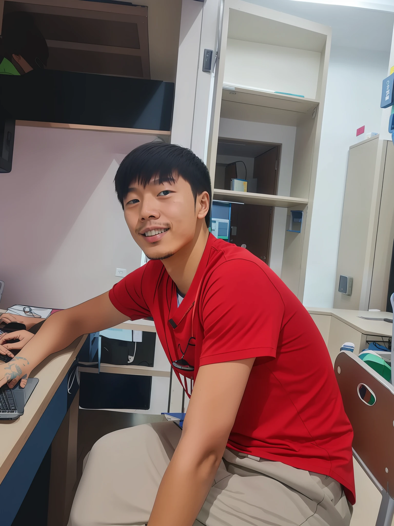 A male student in his 20s wearing a T-shirt sits at his desk and opens his laptop，The neat hospital corridors were empty，Some melancholic atmosphere。