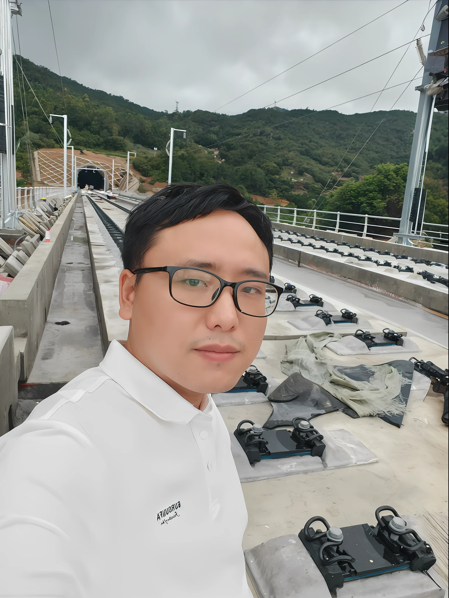 There was a man taking a selfie in front of a pile of guns, 8k selfie photograph, zeng fanzh, photograph taken in 2 0 2 0, huifeng huang, with the mountains in the background, Chiba Yuda, yintion j - jiang geping, with the mountains in the background