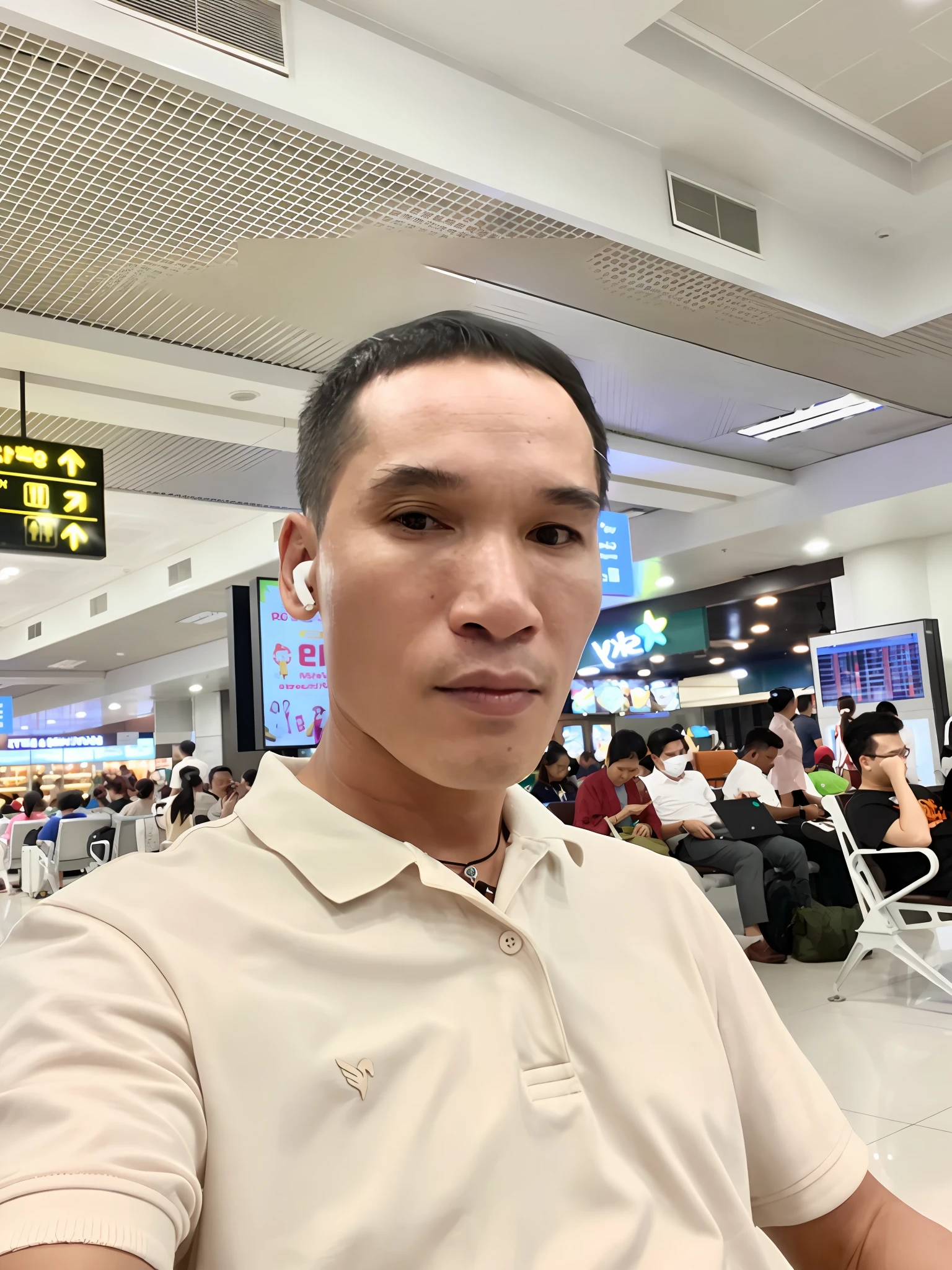 arafed man sitting in an airport waiting area with a cell phone, hoang long ly, 3 2 years old, 4 0 years old man, 38 years old, (38 years old), 3 6 years old, 2 8 years old, 2 7 years old, 2 9 years old, 8k selfie photograph