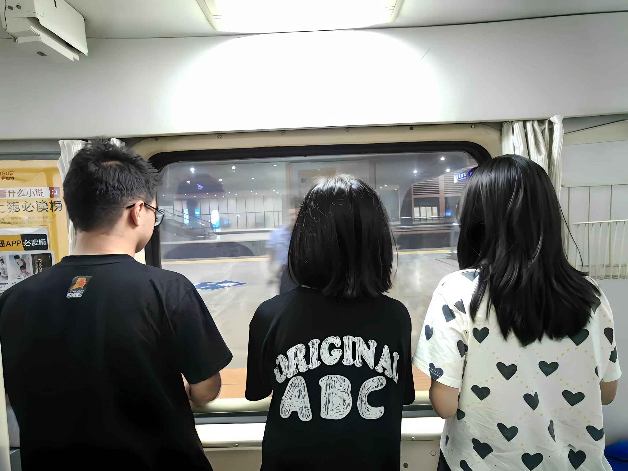 Three people look out the window at the train with heart-shaped windows, Looking out the window, looking out, looked at big window, looks out the window, side looking, looking in the window, looks out the window, With your back to the camera, taken with sony alpha 9, next to a big window, back to us, they are very serious