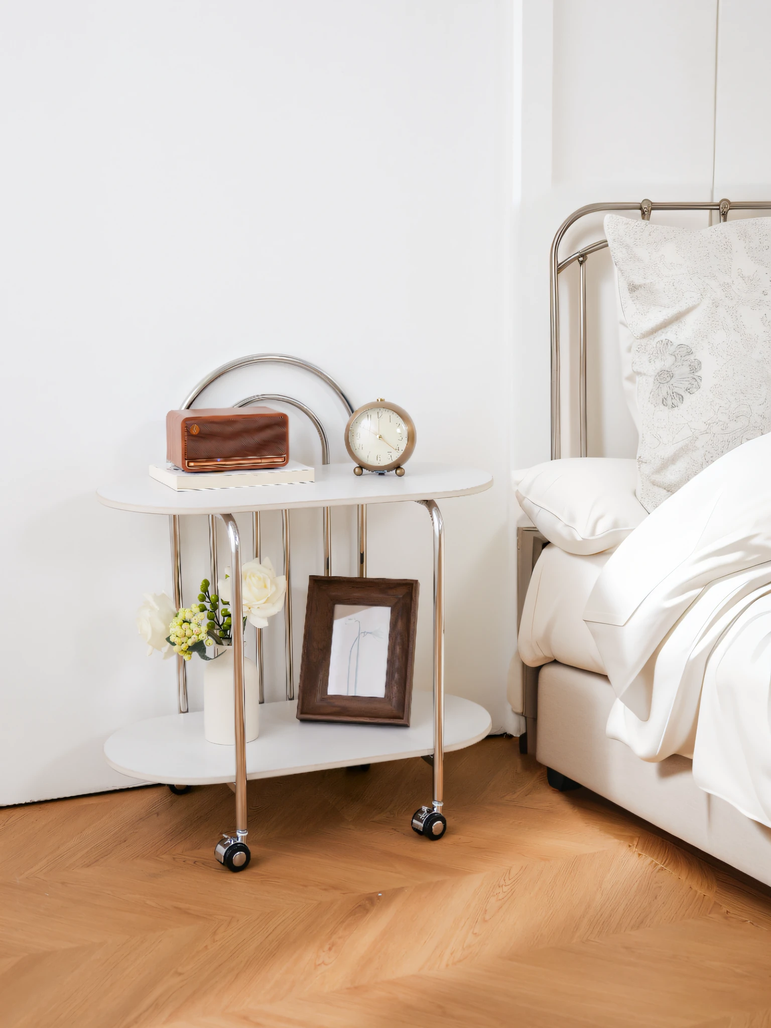 A corner of a light-colored tie bed