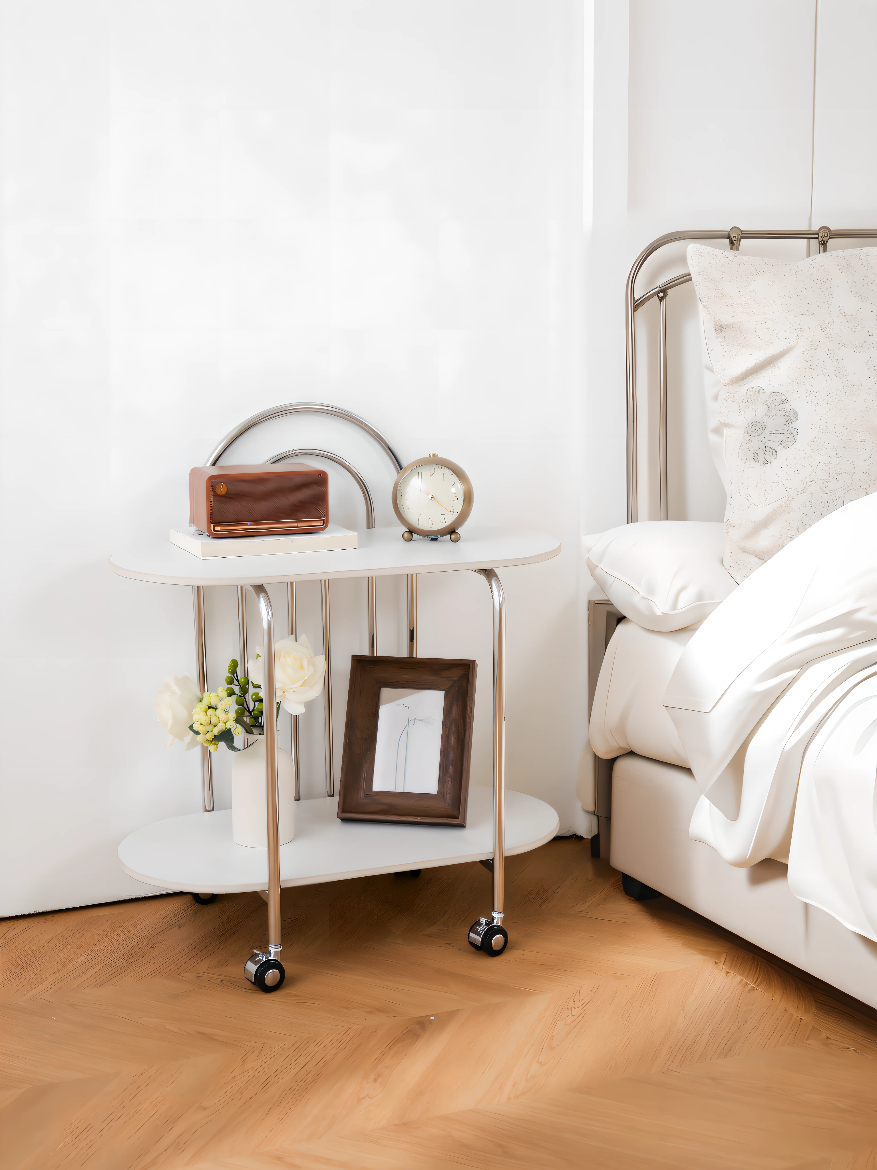 A corner of a light-colored tie bed