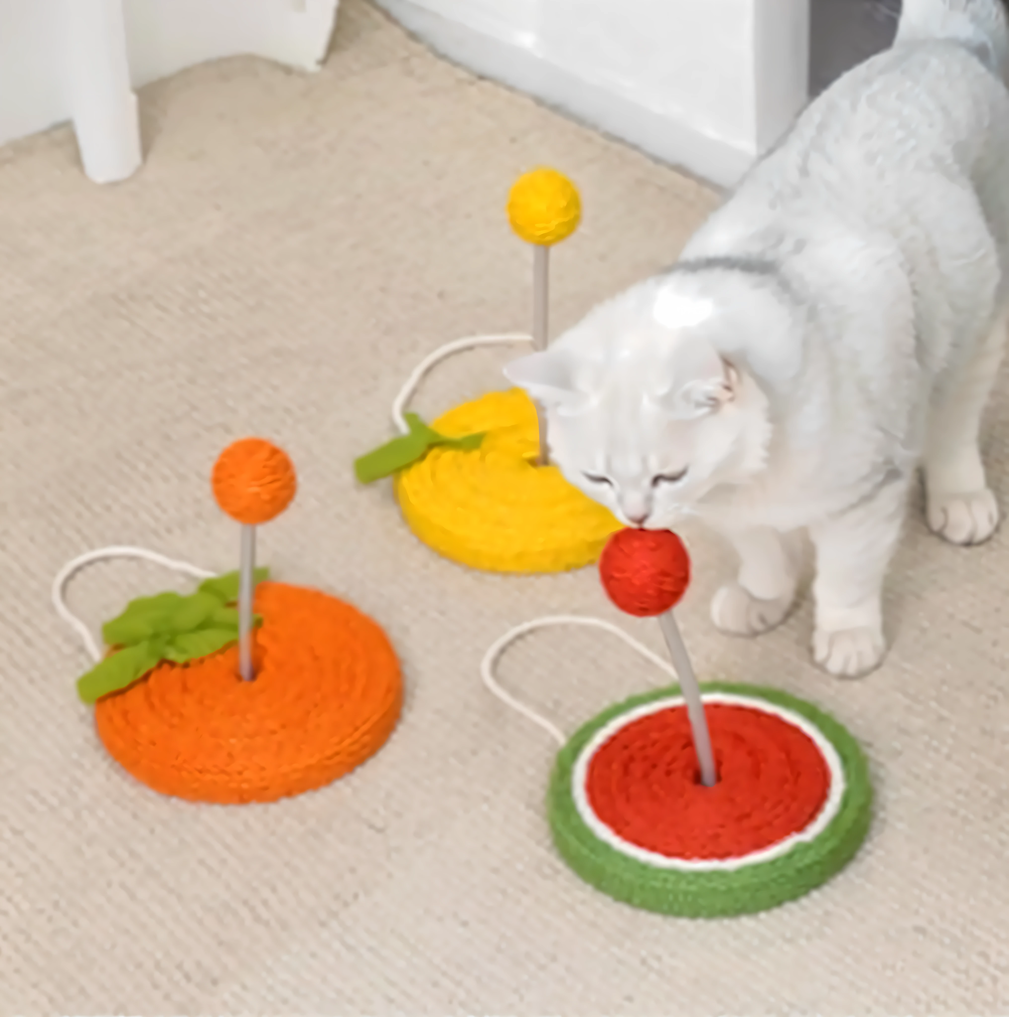 There was a cat playing with toys on the floor，Silver gradation