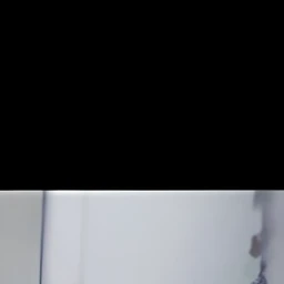 there is a woman taking a picture of herself with her phone, Blurred face, low quality photo, ulzzangs, obscured face, distorted photo, low quality photo, Detailed unblurred face, very very low quality picture, low quality grainy, She is facing the camera, very very low quality, Guviz, blurry image, grainy low quality