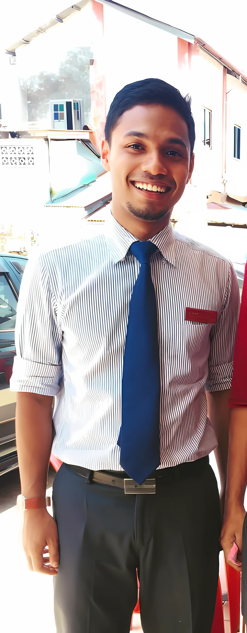 A handsome man, in messy library