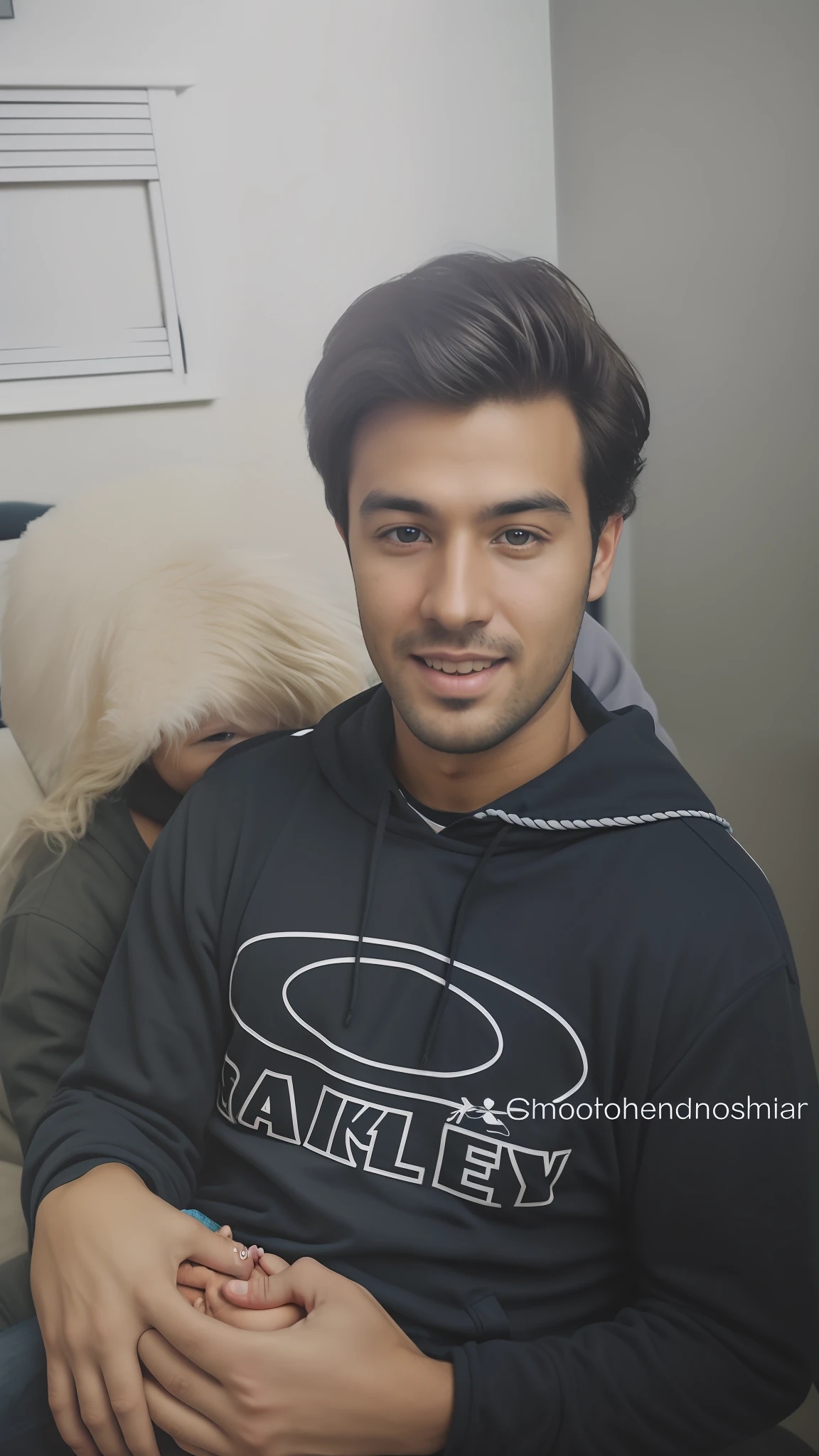 Photo of man with baby on lap