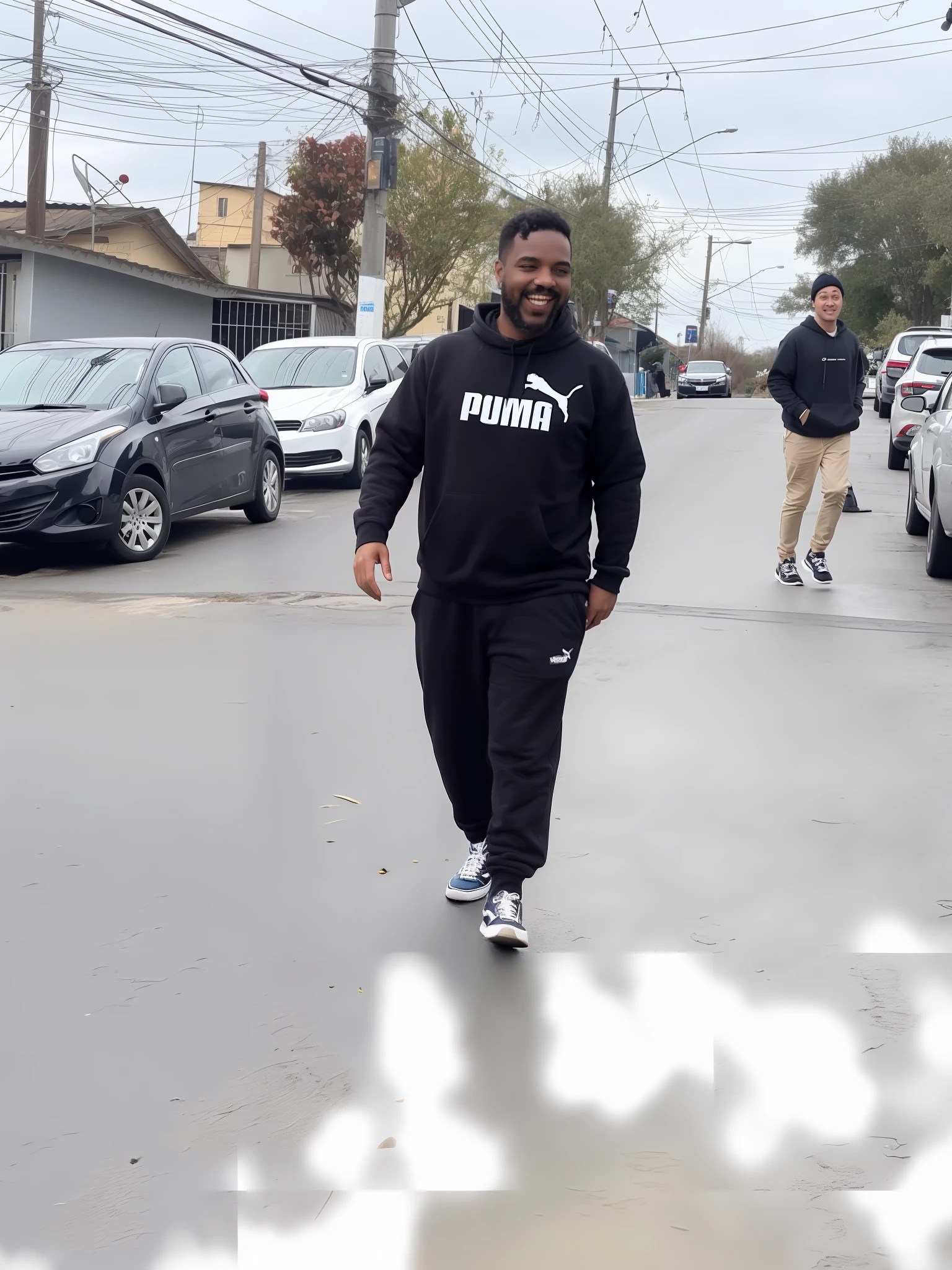 There's a man walking on the moon in a black sweatshirt,