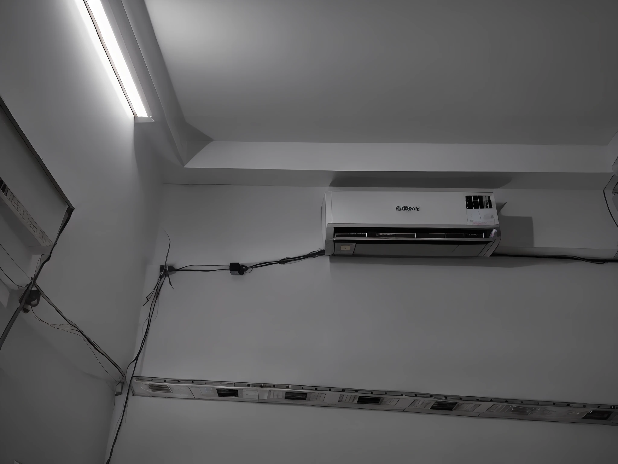 there is a air conditioner that is on the wall in a room, air conditioner, taken with sony a7r camera, captured with sony a3 camera, taken with sony alpha 9, interesting composition, extremely good lighting, very clear picture, taken with a canon dslr camera, extremely good quality lighting, nice composition, very very low quality picture, light source from the left