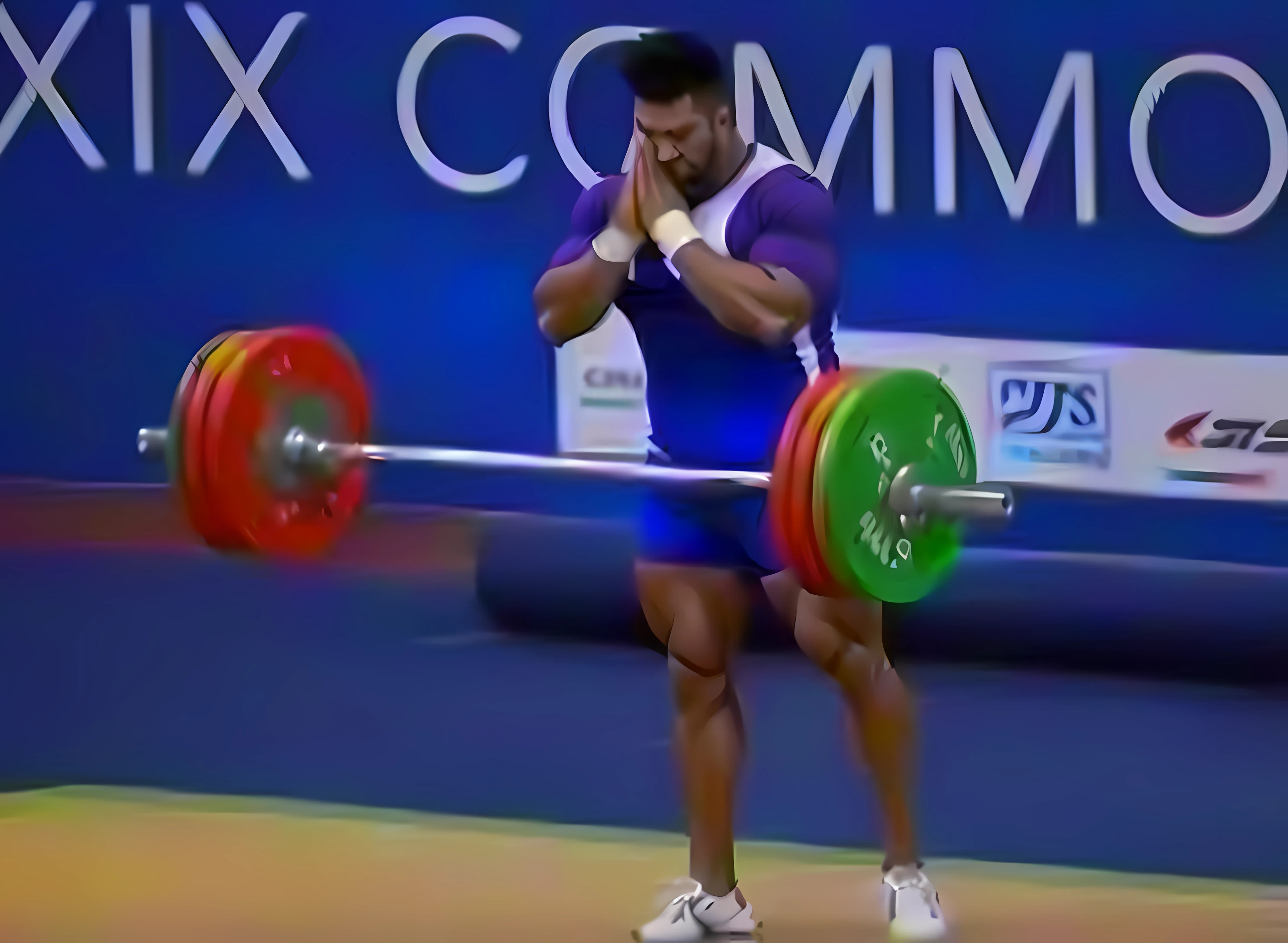 Allard man holding a barbell in a blue shirt and white shorts,Pray with your hands folded Unbelievably strong and tall, chris evans(Chris Evans)As a weightlifter, most strongest pose, Very strong, lifting weights, strongman, impressive winning photo, vladimir nikolov, maxim sukharev, Super strong, thrusters, hiroyuki kato, mohamed chahin, viral photo