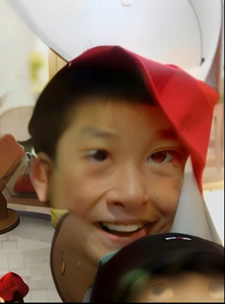 The boy in the red hat is cute and cute