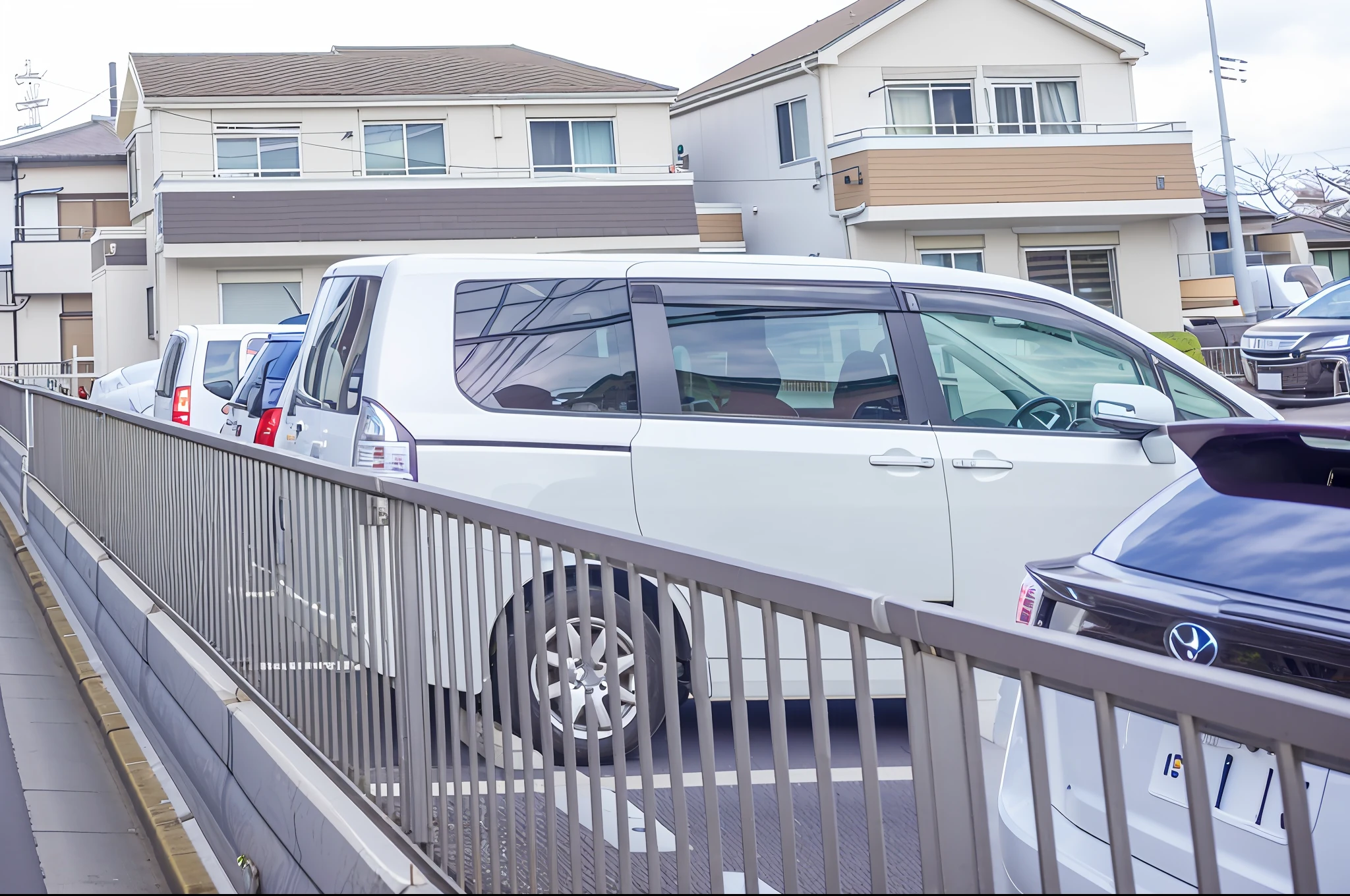 A white van is parked on the side of the road, set in tokyo bank parking lot, taken with sony a7r camera, Street parking, cars parked, taken with canon 8 0 d, Parked Cars, taken with canon eos 5 d mark iv, photo taken with sony a7r, Residential area, Car parked below