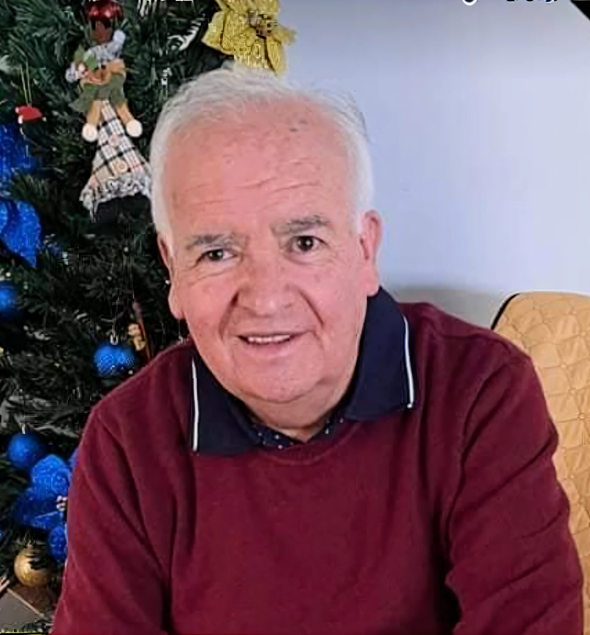 There's a man sitting in a chair in front of a Christmas tree, giuseppe dangelico pino, Donoto Giancola, Ignacio Fernandez Rios, paolo eleuteri serpieri, Annibale Siconolfi, Esteban Sándorfi, Jean Pierre Ugarte, salustiano garcia cruz, ignacio fernandez rios