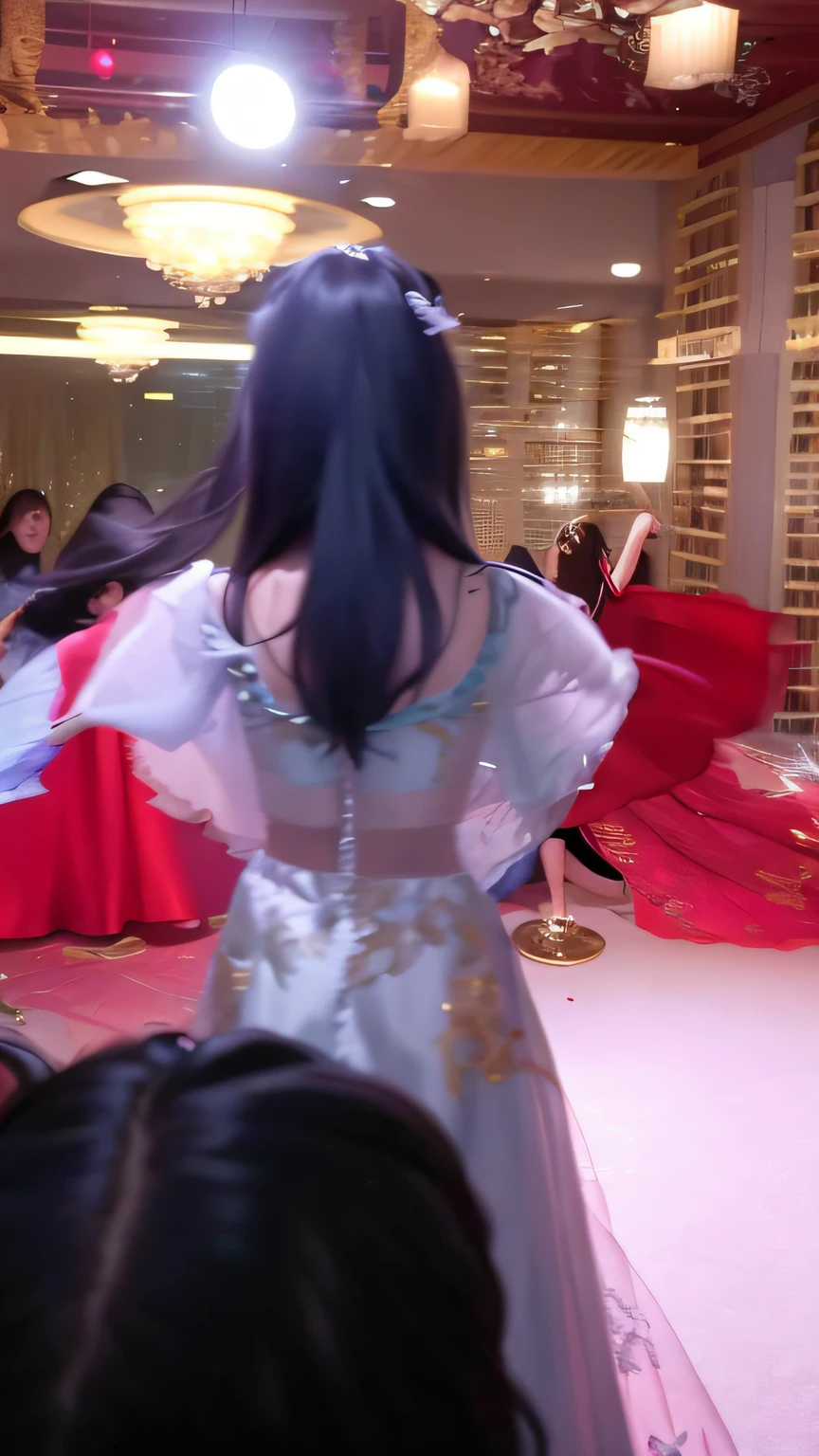 A woman in a dress stood in the room, dancing in the background, other women dancing behind, low quality video, she is dancing, low quality footage, Back view!!, photo still of behind view, as though she is dancing, With your back to the camera, wearing organza gown, At the party, With your back to the camera, long shot from back