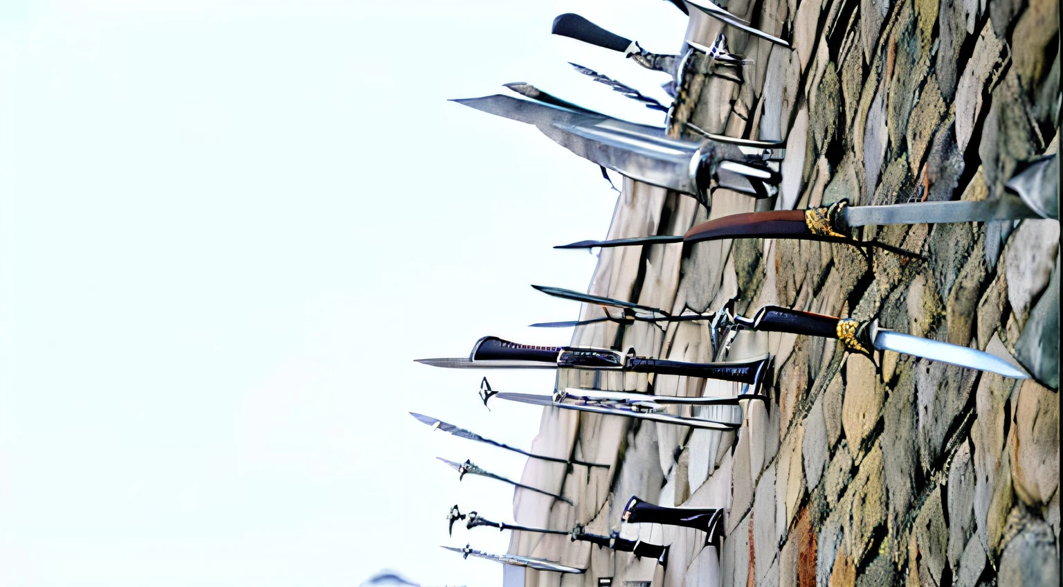 There are a lot of knives hanging on the walls, many swords, Multiple floating swords, The sword was stuck in the ground, Swords, battlements, metal swords, The sword points to the sky Ancient century weapons, spears, Handle on the wall, long sword, activity with fight on swords, Torches on the wall, abandoned weapons