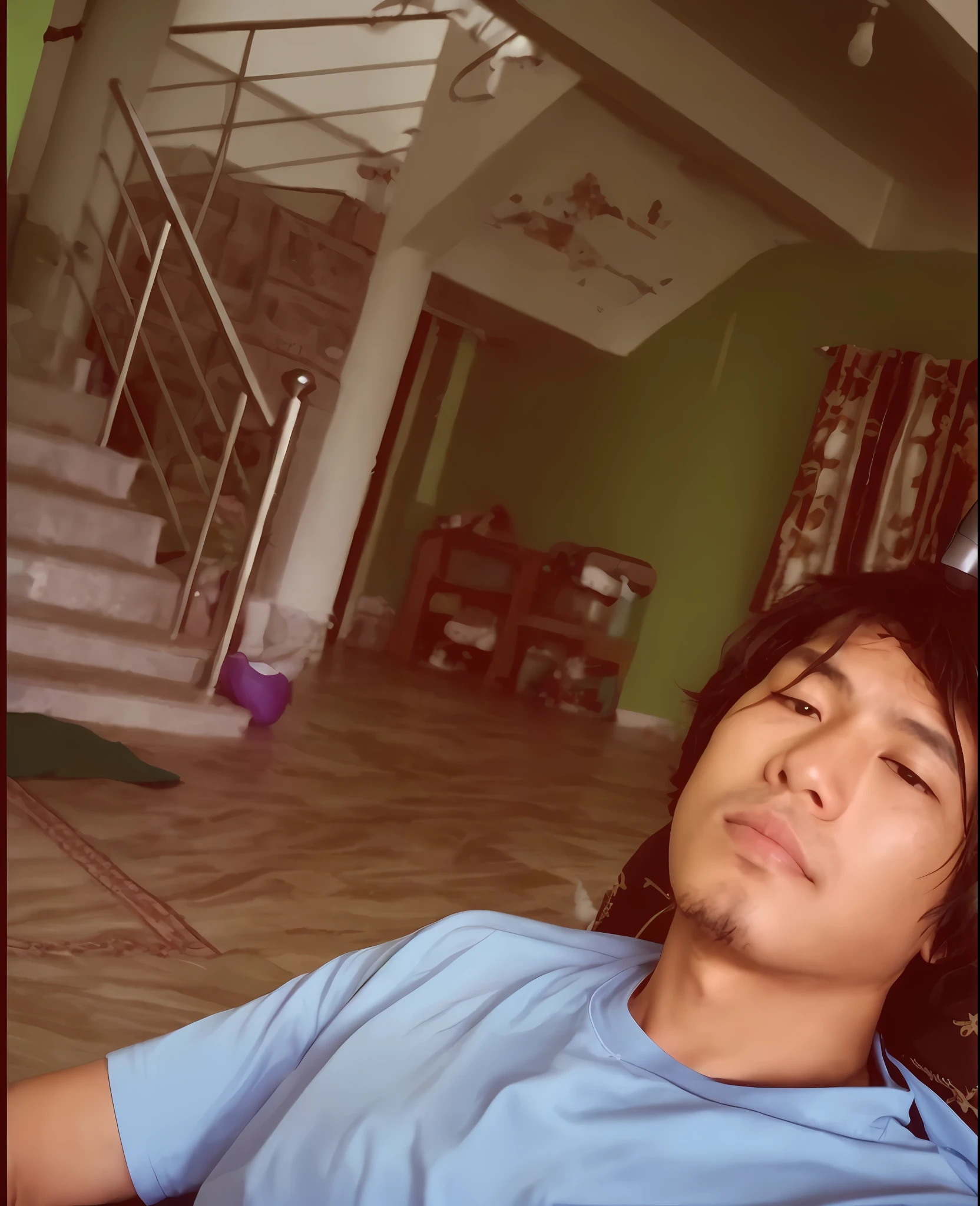 there is a man laying on the floor with his head on a remote, very very low quality picture, morning time, leaked photo, relaxing after a hard day, around 1 9 years old, with accurate face, ayan nag, he is very relaxed, help me, resting after a hard fight, with kind face, old picture, with funny feeling, selfie photo