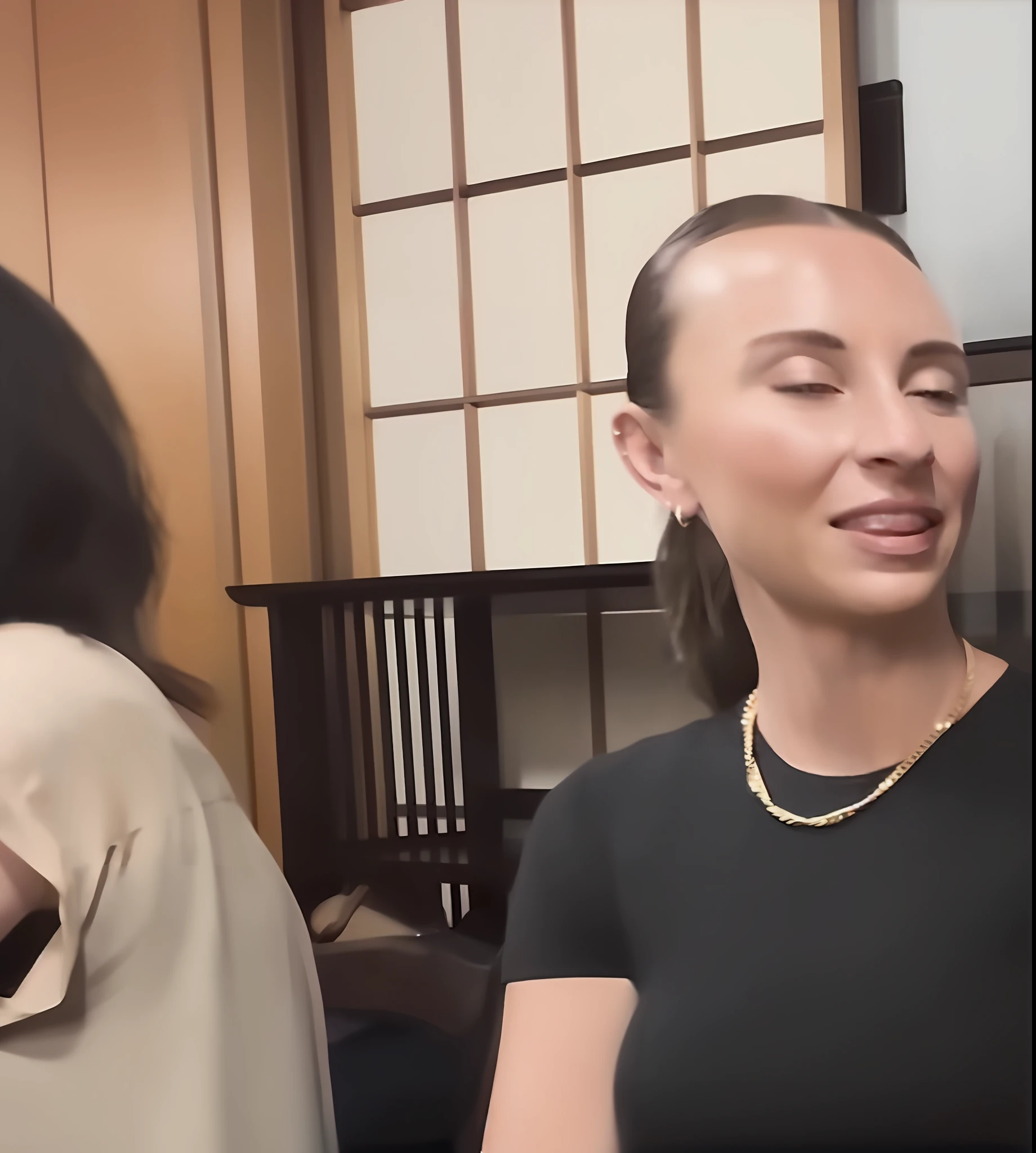 Woman sitting in front of laptop computer talking to another woman, in a japanese apartment, sitting in tokyo, Japanese, 30-year-old French woman, Japanese Models, she is facing the camera, Probably in the 30s, taken in the early 2020s, in Tokyo under, russian and japanese mix, Candid photos of Gal Gadot