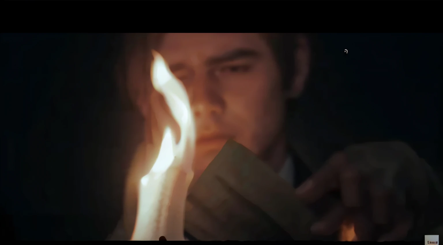 there is a man burning a paper on a lit candle in his hand, Campfire light, sad vibe