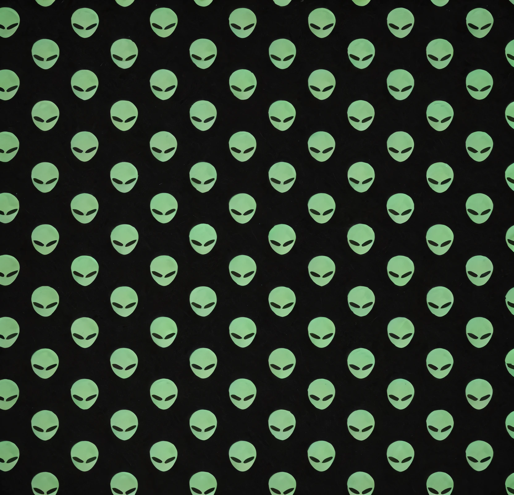 Close up of black background with green alien head, alien fabric, aliens in the background, Alien faces, alien design, sci fi patterns, Glowing alien symbol, Shaped skin, ufo aliens, alien skull, populated with aliens and people, Alien invasion. 2 4 mm, Alien art, alien room background, Alien vibes, space alien, ufology, Alien eyes