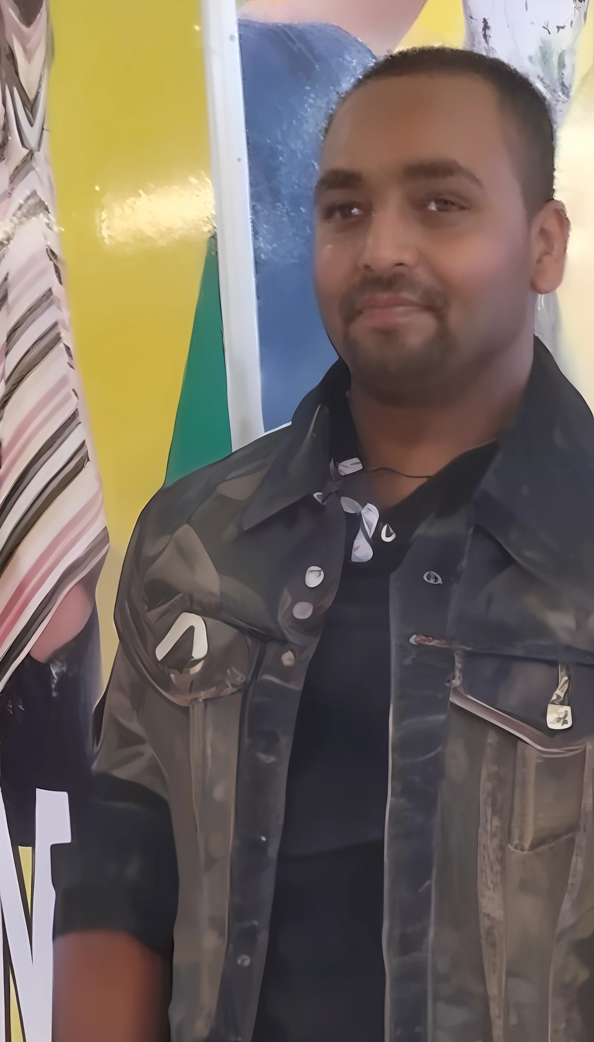 arafed man in a black shirt and a camo jacket, taken in the late 2010s, taken in the early 2020s, profile photo, profile picture, about 3 5 years old, in style of davey adesida, profile pic, ástor alexander, taken in the late 2000s, around 1 9 years old