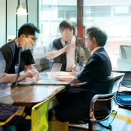 Two people sitting at their desks eating ice cream, Eating ice cream, eating ice - cream, yanjun cheng, wenjun lin, yiqiang and shurakrgt, ice cream on the side, 8k selfie photograph, xintong chen, Art student, he is about 2 5 years old, Ruan Jia and Fenghua Zhong