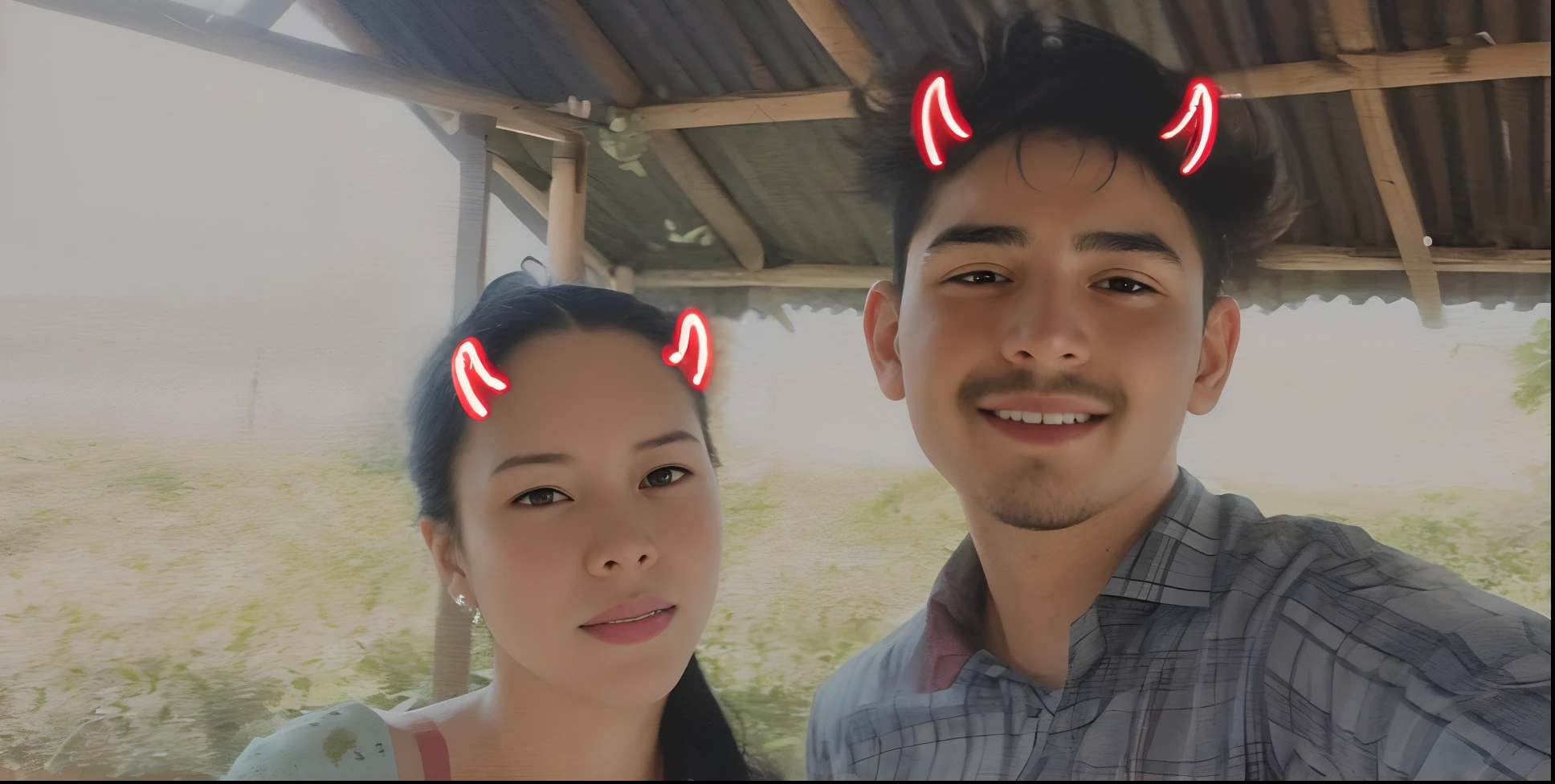 there are two people standing next to each other with red devil horns on their heads, distorted photo, very very low quality picture, low quality photograph, scratches on photo, very accurate photo, with instagram filters, long distance photo, 😭🤮 💔, profile image, low quality photo, low quality instant camera photo, couple, profile pic, grainy low quality