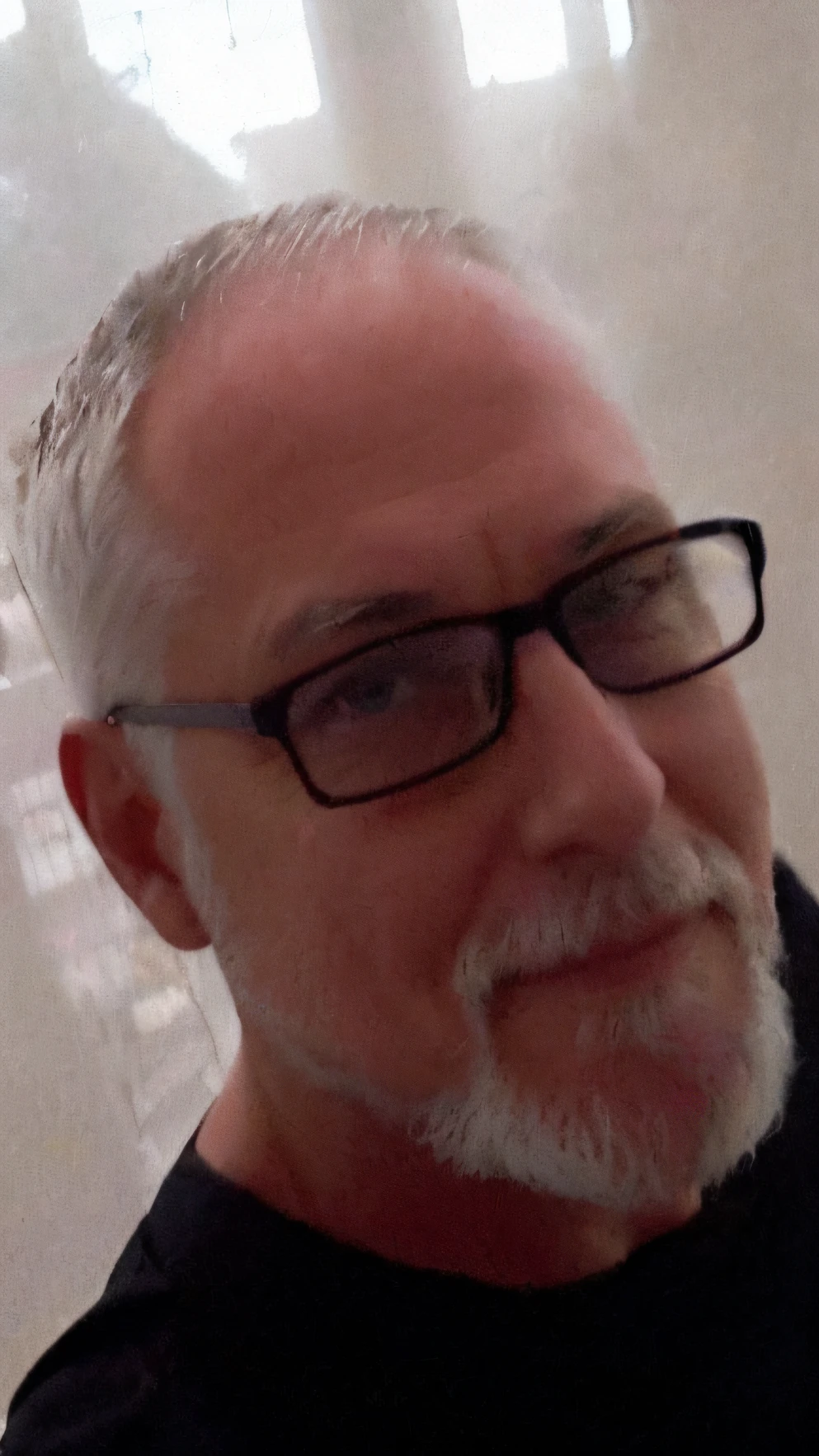 there is a man with glasses and a beard wearing a black shirt, inspirado em Phil Foglio, imagem de perfil, with glasses and goatee, foto de um homem branco de 50 anos, taken in the early 2020s, robb cobb, foto de perfil, Greg Rutkovsky, barba branca curta, with nerdy glasses and goatee, man with glasses