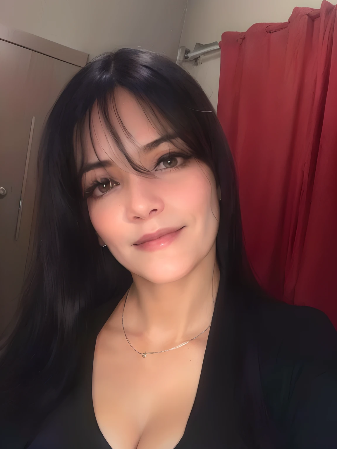 Woman with long black hair looking at the camera and is 42 years old