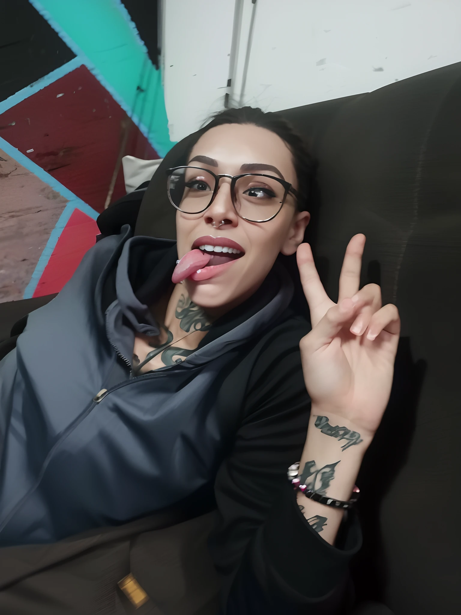 There is a woman with a tattoo on her arm and a peace sign, Tongue out, with a tentacle - shaped tongue, long tongue, imagem de qualidade muito baixa, Tongue sticking out, large tongue, Marischa Becker, boca aberta, com a boca aberta, chilled out smirk on face, foto de baixa qualidade, lambendo para fora