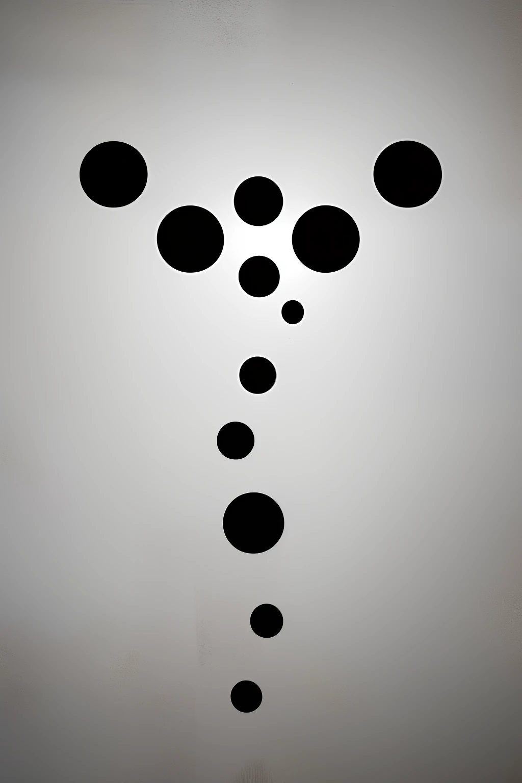 white background with a black dot in the middle