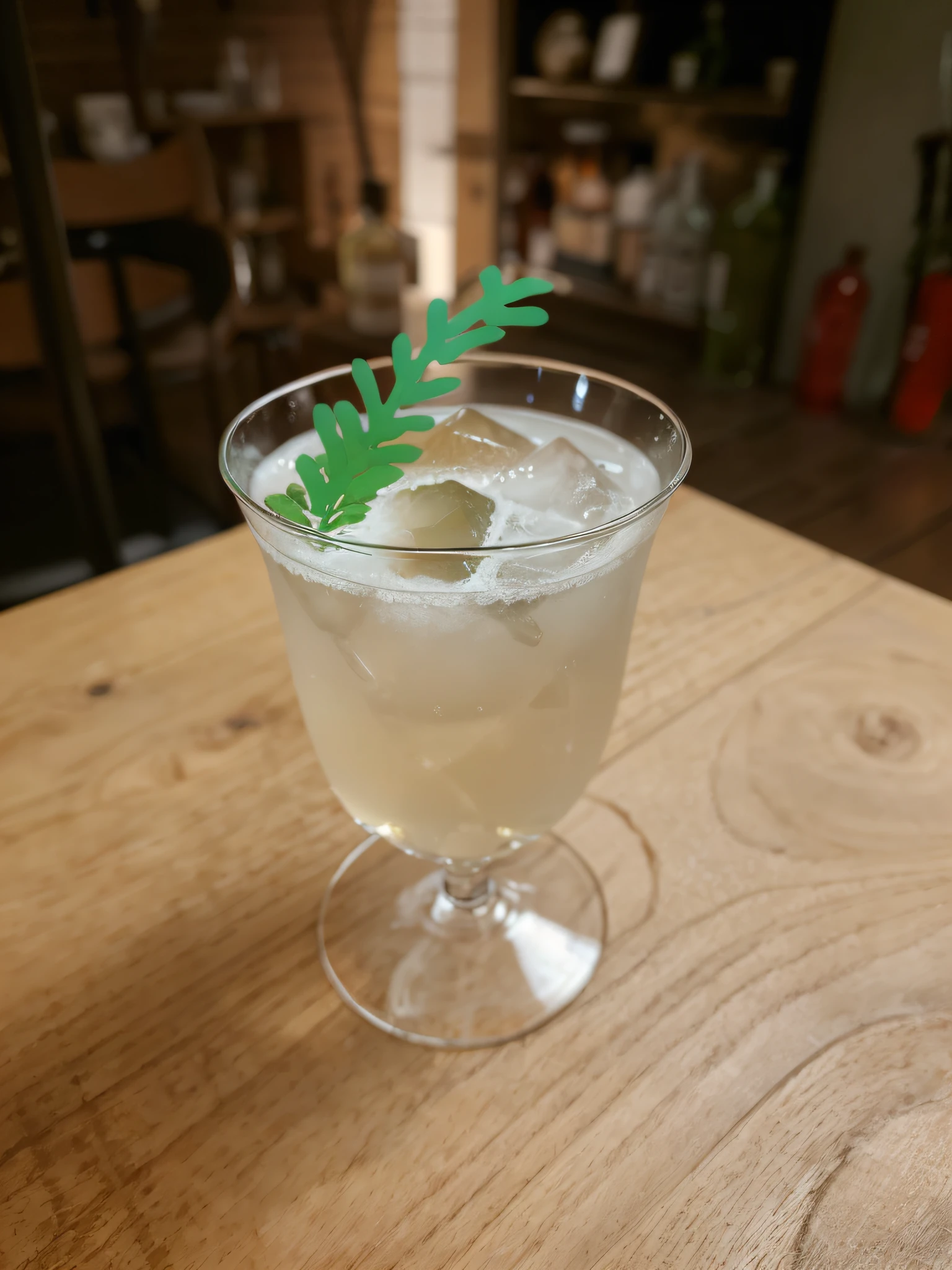 There is a glass of liquid with green leaves, cocktail in an engraved glass, drink, absinthe, Sour, miko, drinking cocktail, Self-restraint, shot on leica sl2, author：Roman Brooke, Inspired by Carlo Martini, abcdefghijklmnopqrstuvwxyz, goto fujita
