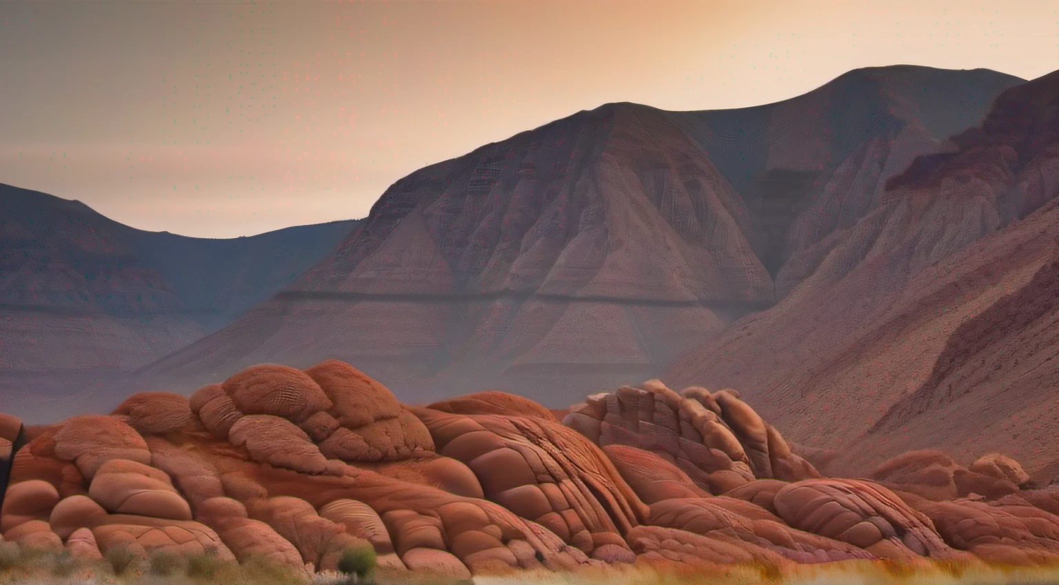 A daytime rocky desert, reddish-brown gigantic rocks,  few cacti, traces of a dried-up river.