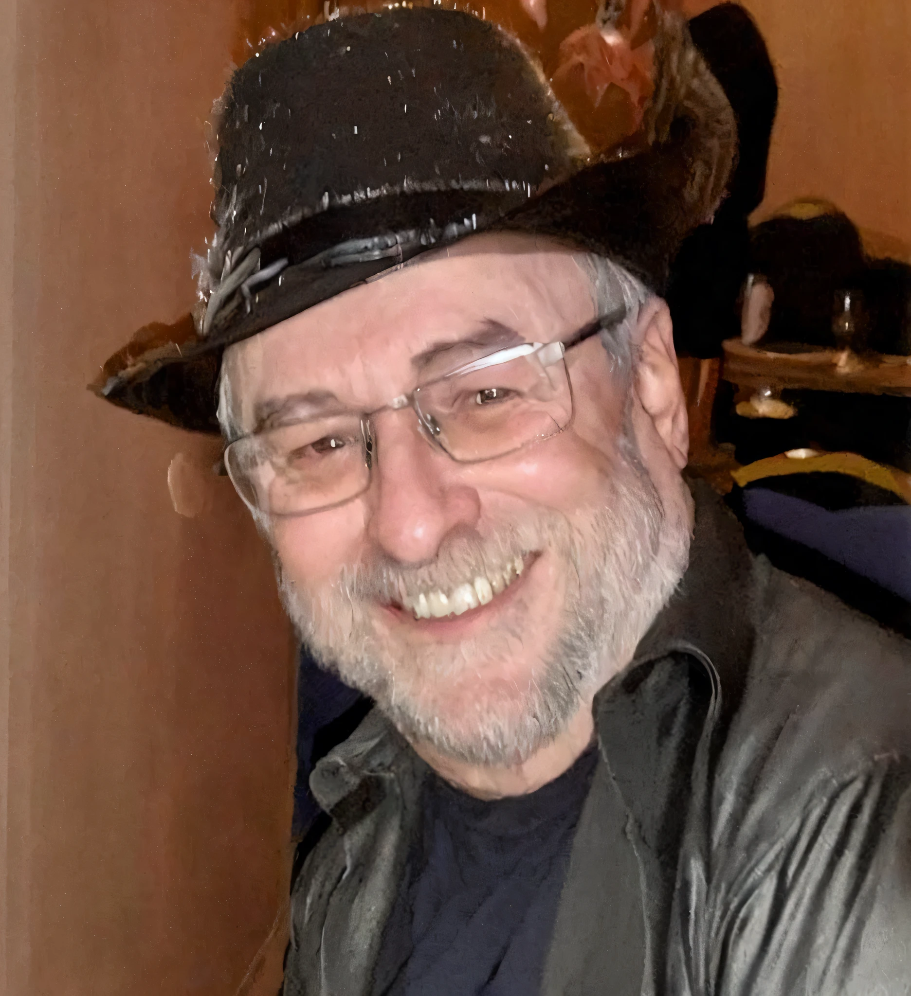 smiling man in a black hat and glasses sitting at a table, taken in the early 2020s, ray fawkes, michael dante dimartino, taken in the late 2010s, michael kaluta, roger magrini, michael ancel, frank frazeta, photo taken in 2 0 2 0, roy litchenstein