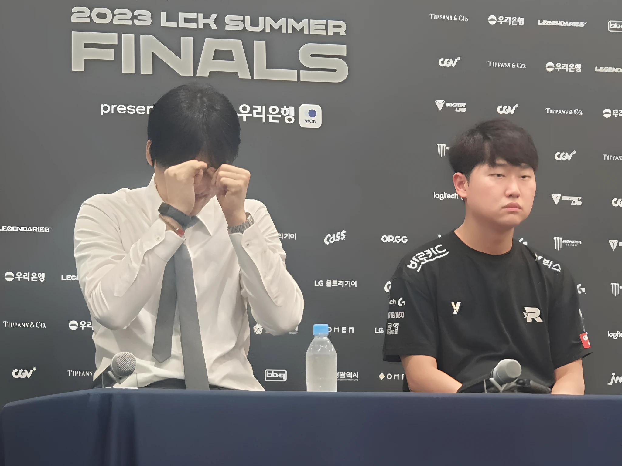 they are two men sitting at a table with a microphone, giga chad crying, riot games, is this loss?, sakimichan and frank franzzeta, jeongseok lee, nixeu and sakimichan, #oc, # oc, gunwoo kim and j.dickenson, 2023, 2 0 2 3, korean artist