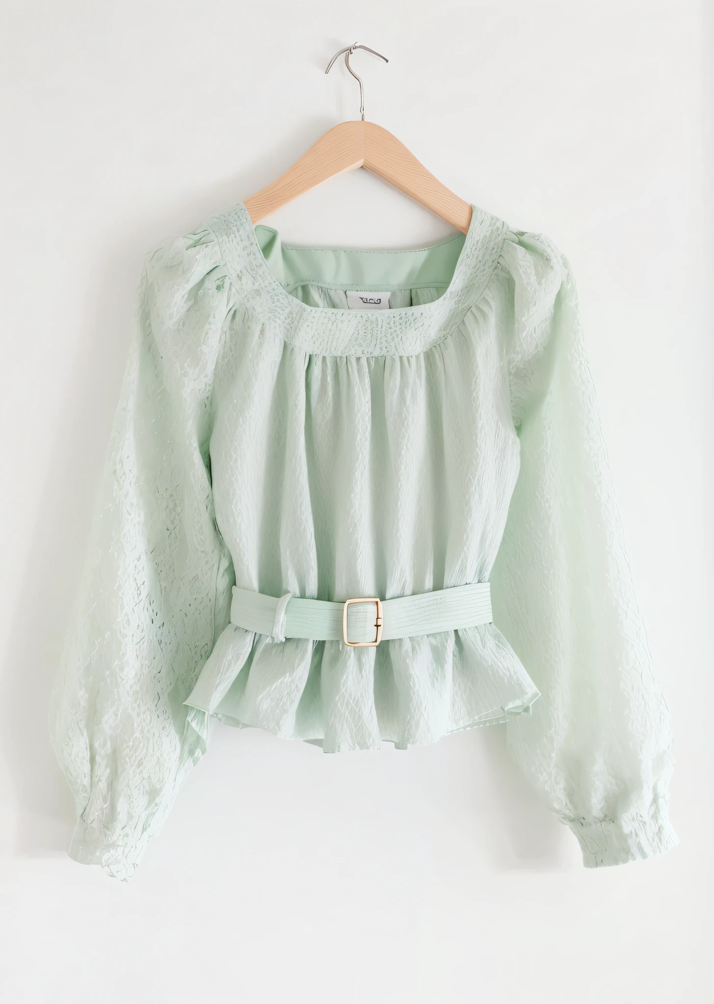 Close-up of green shirt with strap on hanger, Puff sleeves, sea - green and white clothes, Green clothes, pastel green, pastel clothing, verde claro, Green clothing, soft cute colors, pale green glow, verde claro, Green shirt, soft green natural light, loose - fitting blouses, bright pastel color, wearing  shirt