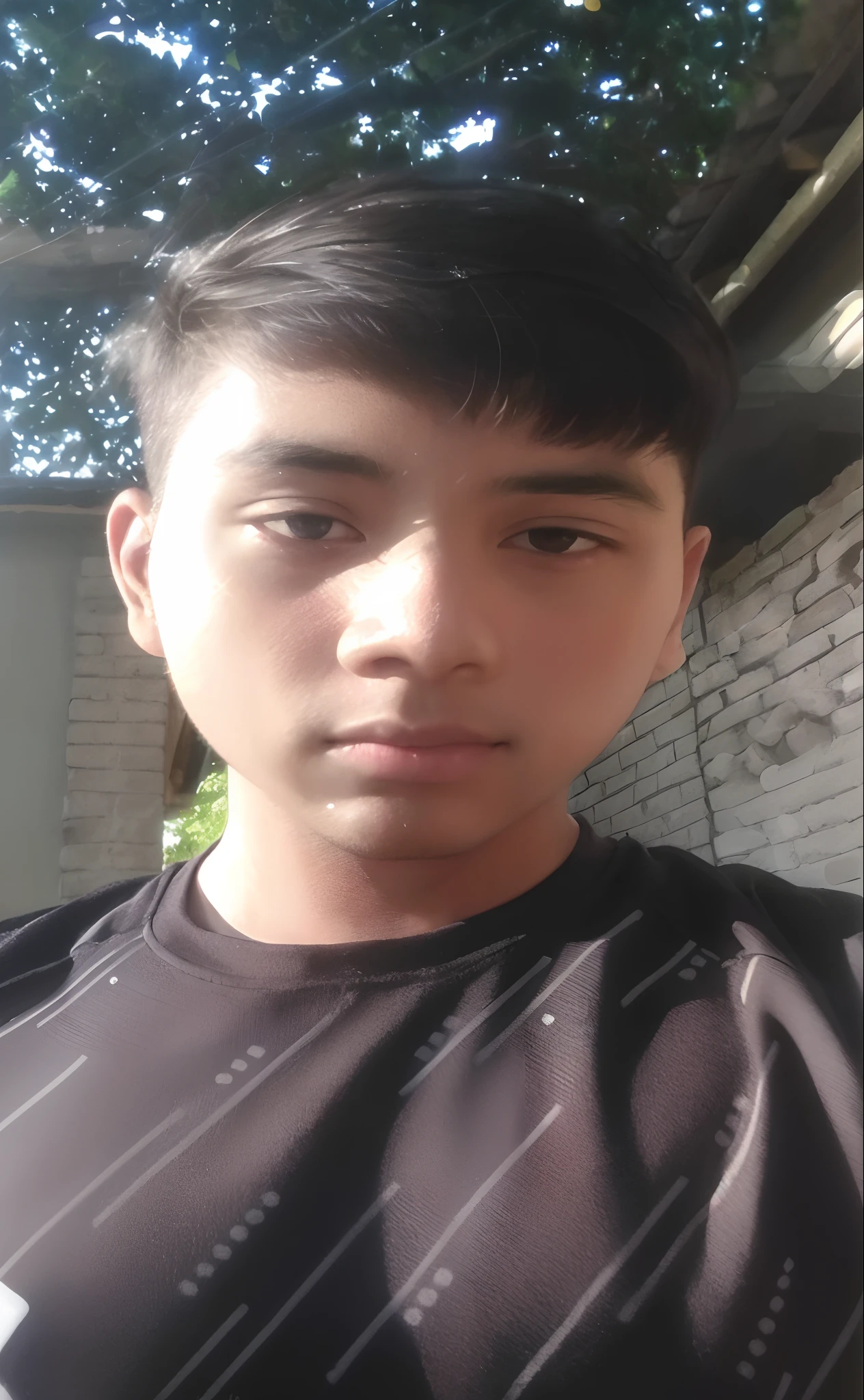 arafed man with a black shirt and a tie standing in front of a brick wall, around 1 9 years old, with accurate face, 18 years old, ayan nag, front profile!!!!, face picture, 1 6 years old, 2 2 years old, riyahd cassiem, selfie photo, 1 9 year old, 21 years old