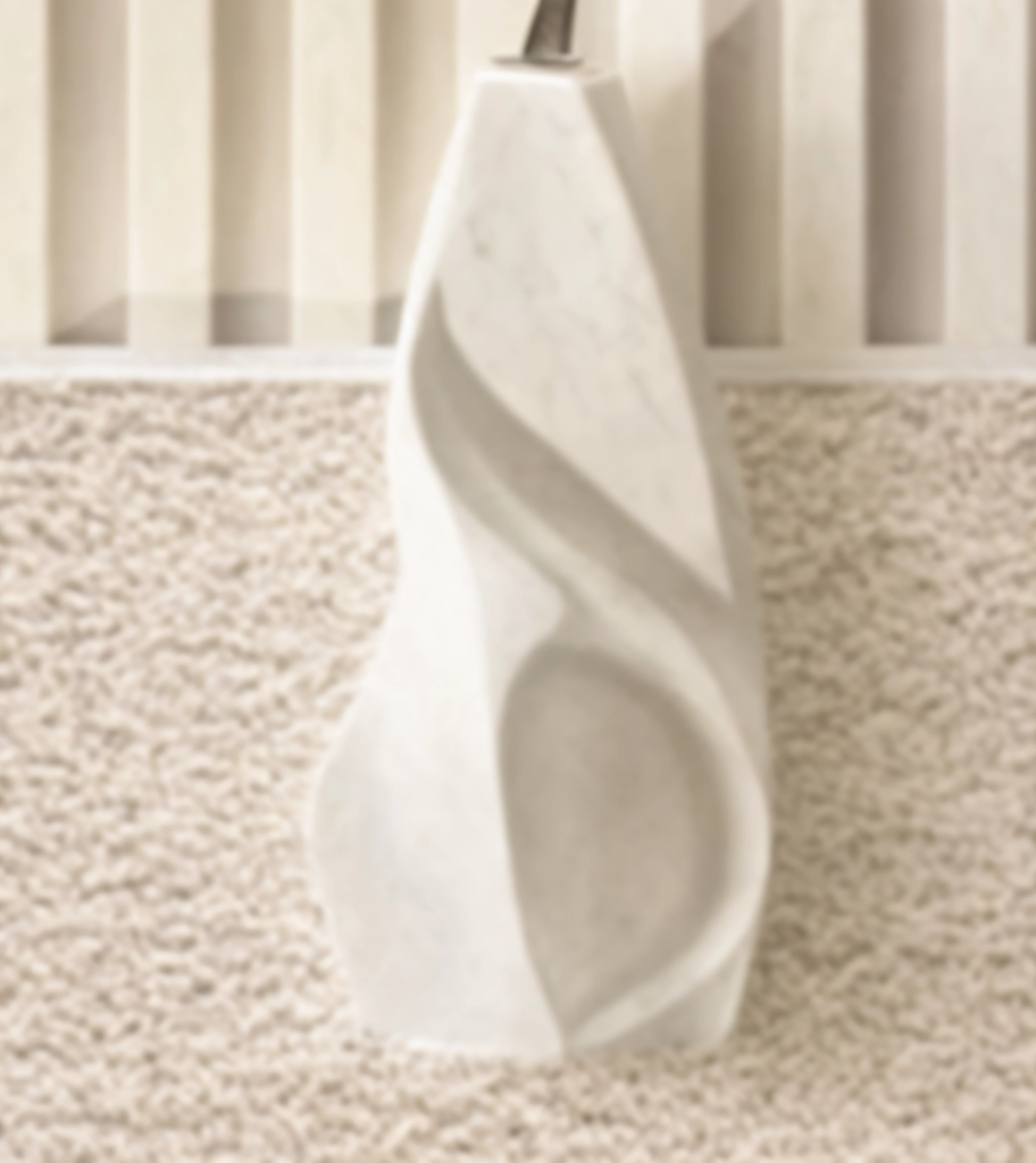 There is a white vase with a white handle on the carpet, White carved abstract sculpture, White marble sculpture, Marble sculpture, a marble sculpture, white ceramic shapes, The stonework, White vase, elegant design, Sculptural, serene emotion, abstract sculpture, carved marble, Carved marble sculptures, bright white porcelain, low - relief stone sculpture, cycladic sculptural style