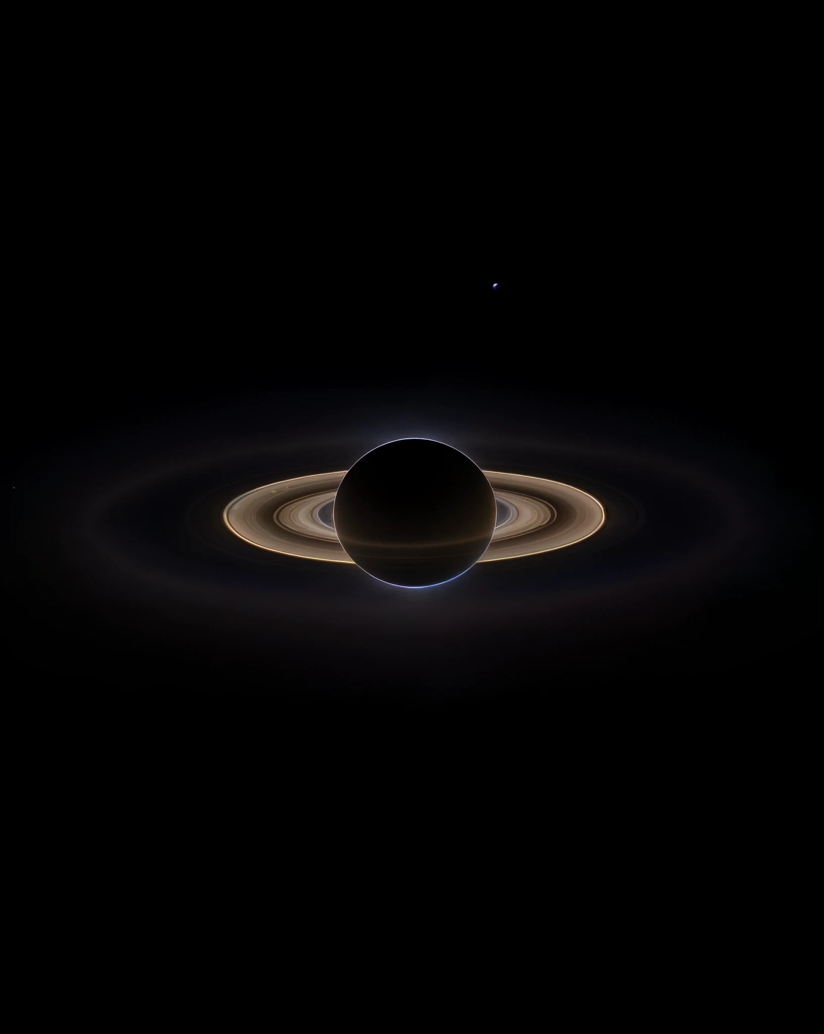 a black background with a saturn ring and a ring of light, spring on saturn, over looking saturn, in honor of saturn, saturn in the background, saturn, planet saturn, visiting saturn, planet with rings, saturn in the sky, nasa photo, nasa photograph, orbiting a gas giant, planets align, nasa image, realistic photo from nasa, nasa photos