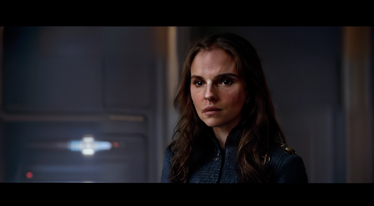 there is a woman with long hair standing in a room, natalie portman in star trek, padme amidala, she has a distant expression, natali portman, but a stern look about her, emma watson in star trek, natalie portman as a goddess, as a starfleet officer, “natalie portman, a still of an ethereal, young natalie portman