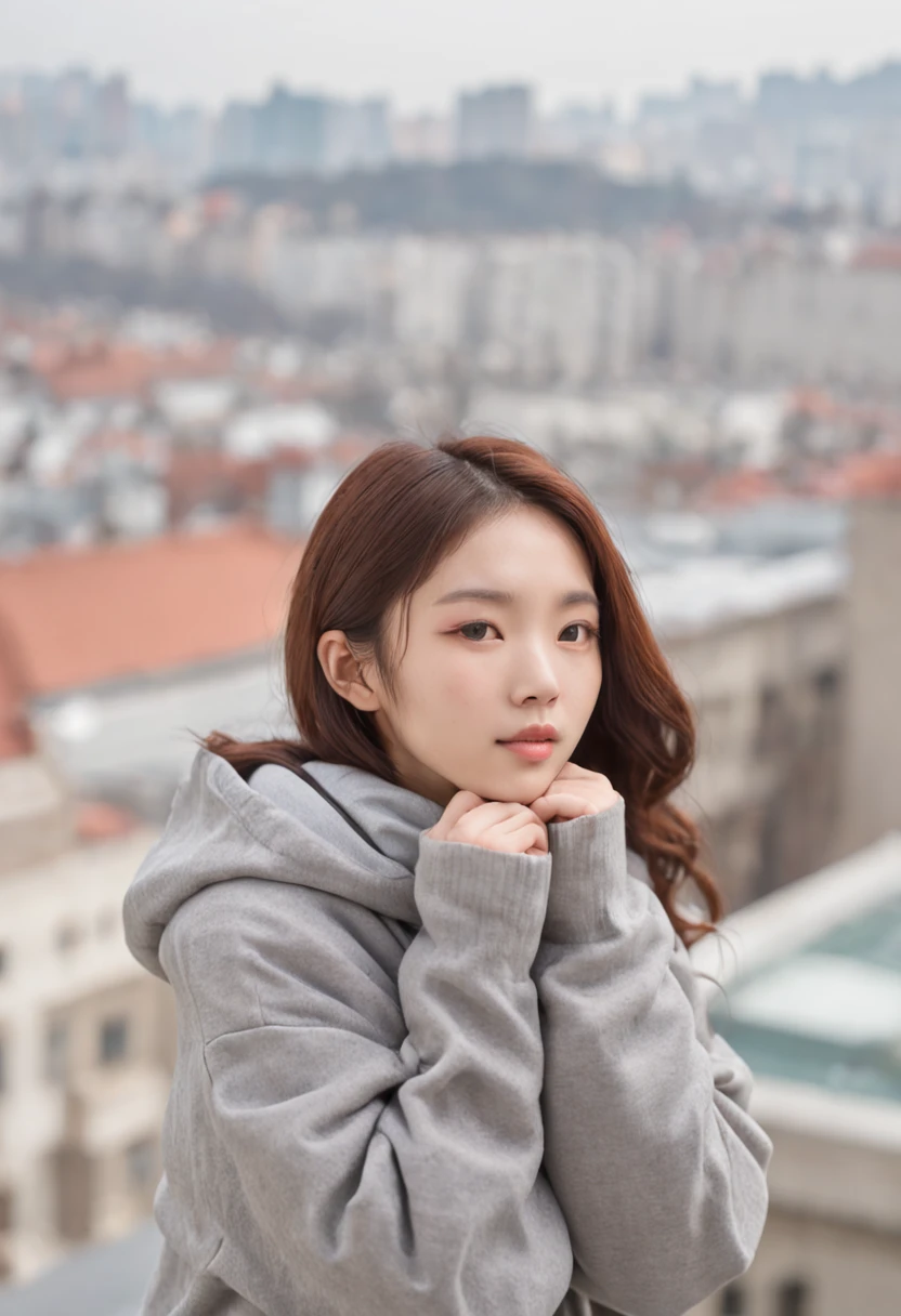 a cute petite Korean woman floating in the air, looking down on the view, buildings on the side, sunlight bouncing off her hair, oversized hoody, charming look, winter weather