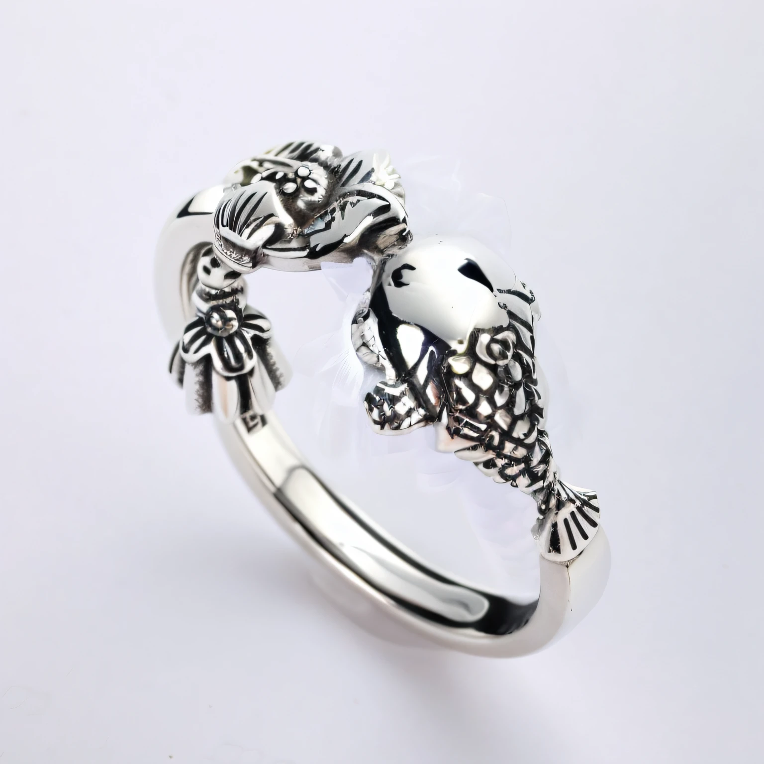 There is a silver ring，There is a fish and a flower on it, silver trinkets, Silver, manual, ring, silver ornaments, Armillary sphere ring jewelry, Detailed picture, Cute, List image, adolable, aokan, Silver color, high detal), swirling silver fish, hook as ring, Front side view, hints of silver jewelry, miniature product photo，There is a beautiful jewelry box next to it