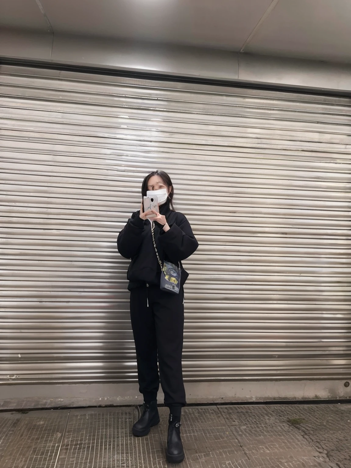 woman in black jacket taking a picture of herself with a cell phone, stood outside a corner shop, wearing japanese techwear, wearing all black mempo mask and sunglasses, photograph taken in 2 0 2 3, masked person in corner, in front of ramen shop, photograph of a techwear woman, standing in an alleyway, wearing a mask, photo taken in 2 0 2 3