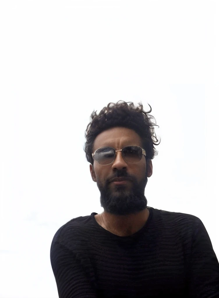 there is a  mixed race man with dark ray-ban sunglasses, a beard and a black shirt,38 years old, 3 6 years old, 3 2 years old, (38 years old), about 3 5 years old, standing in front of a futuristic cityscape, dark blue skies with clouds and birds in the distance, flying cars, drones.