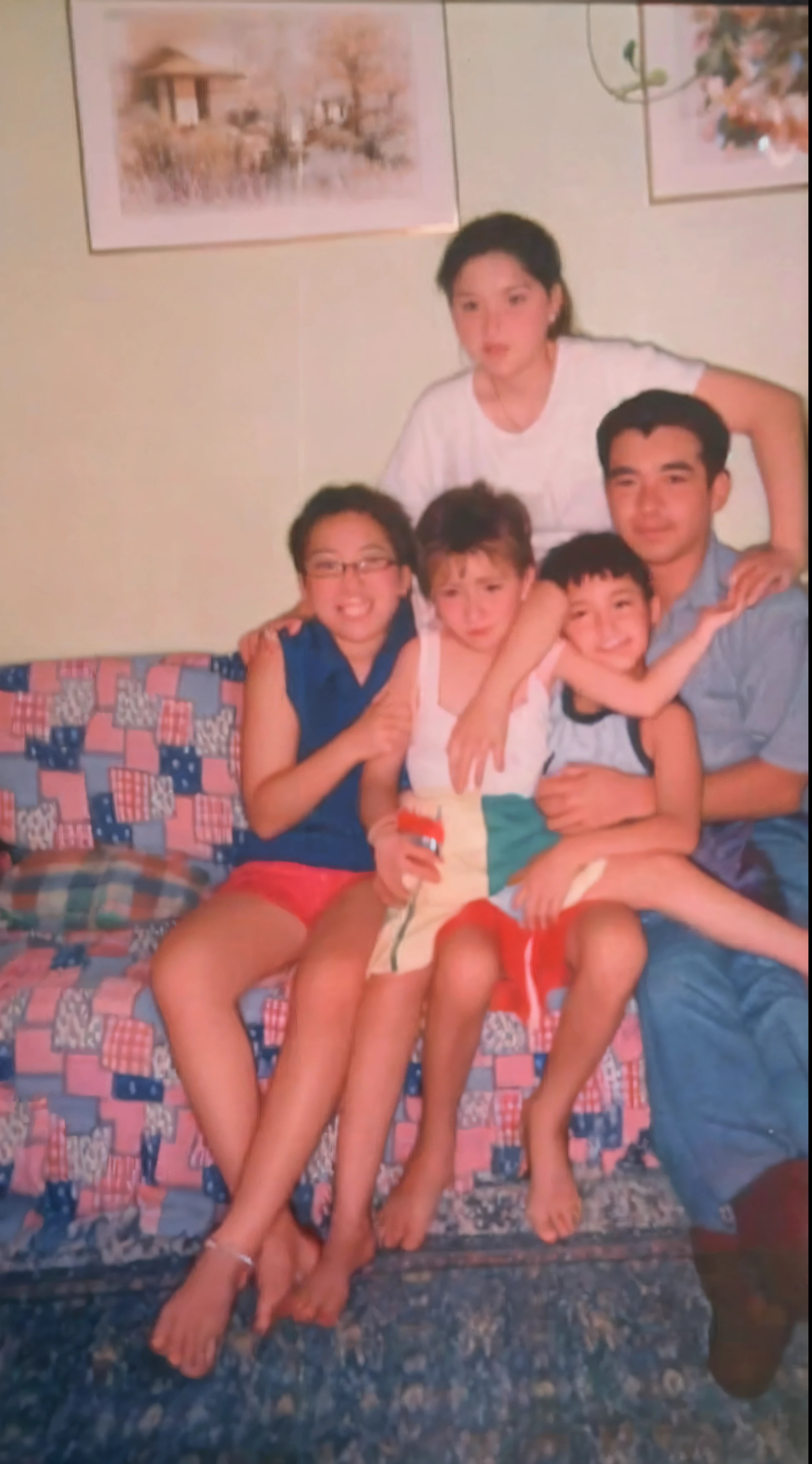family photo of husband and wife and 2 sons