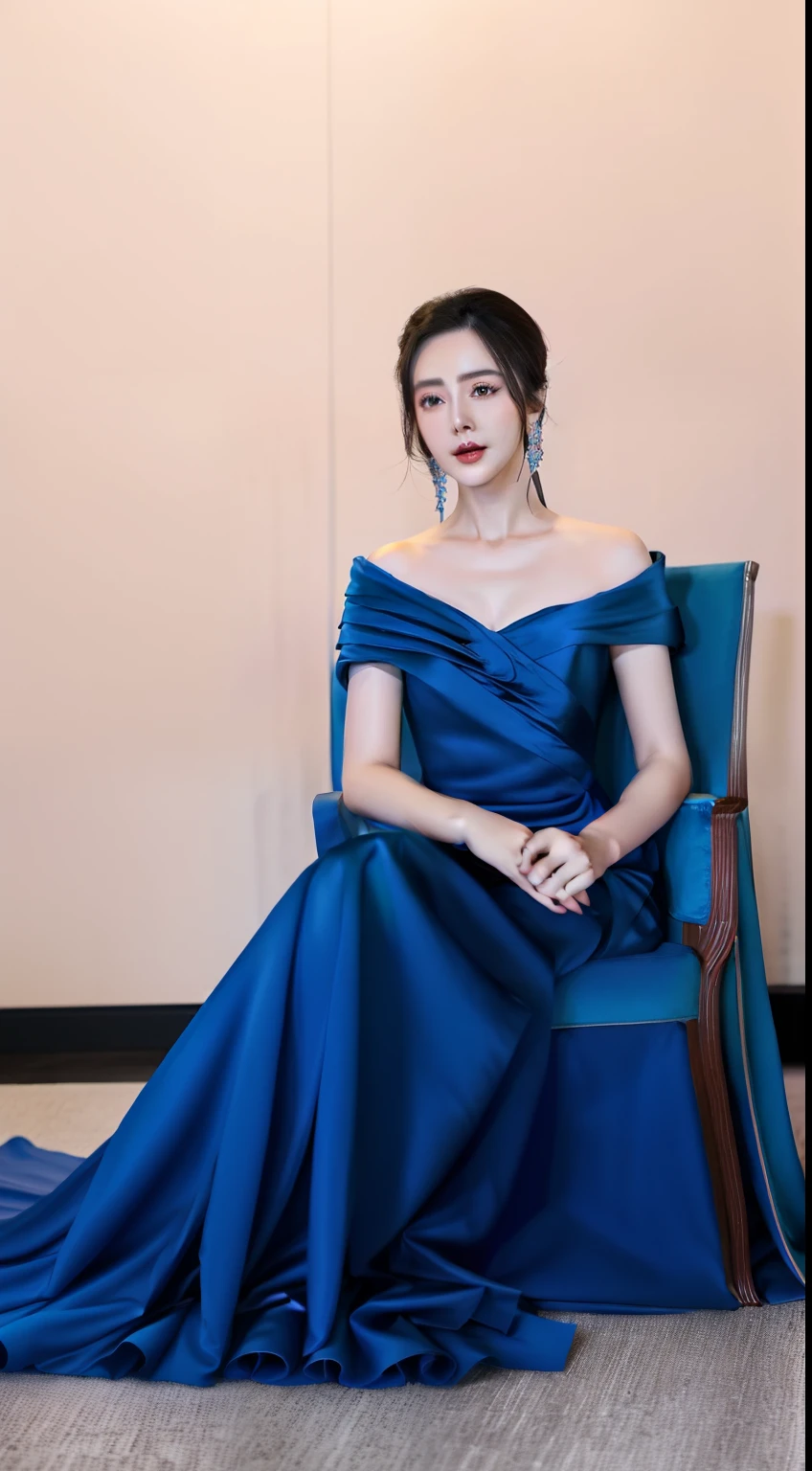 a close up of a woman in a blue dress sitting on a chair, dilraba dilmurat, Ethereal beauty, Dressed in elegant dresses, ruan jia beautiful!, gorgeous chinese models, yanjun cheng, wenfei ye, wearing long gown, dressed beautiful gown, Wearing a gorgeous dress, wearing evening gown, a stunning young ethereal figure