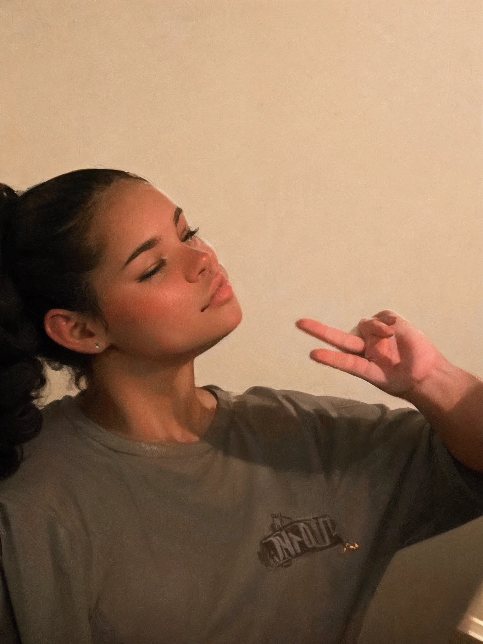 Picture of a pretty girl with a curly hair ponytail. Posing with a peace sign. Making a duck face with her lips
