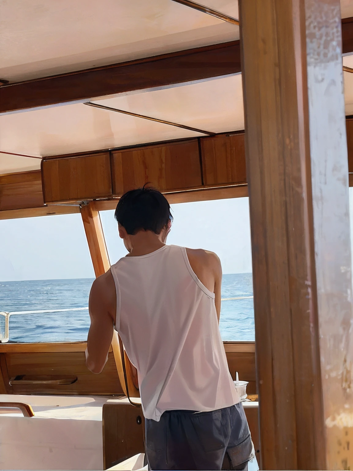 There was a man standing on a boat looking at the water, On a yacht at sea, On a boat, On the sea, he's on an old sailing boat, the photo was taken from a boat, on the bow, 26 year old man on a sailboat, Outside the boat window, looking at the ocean
